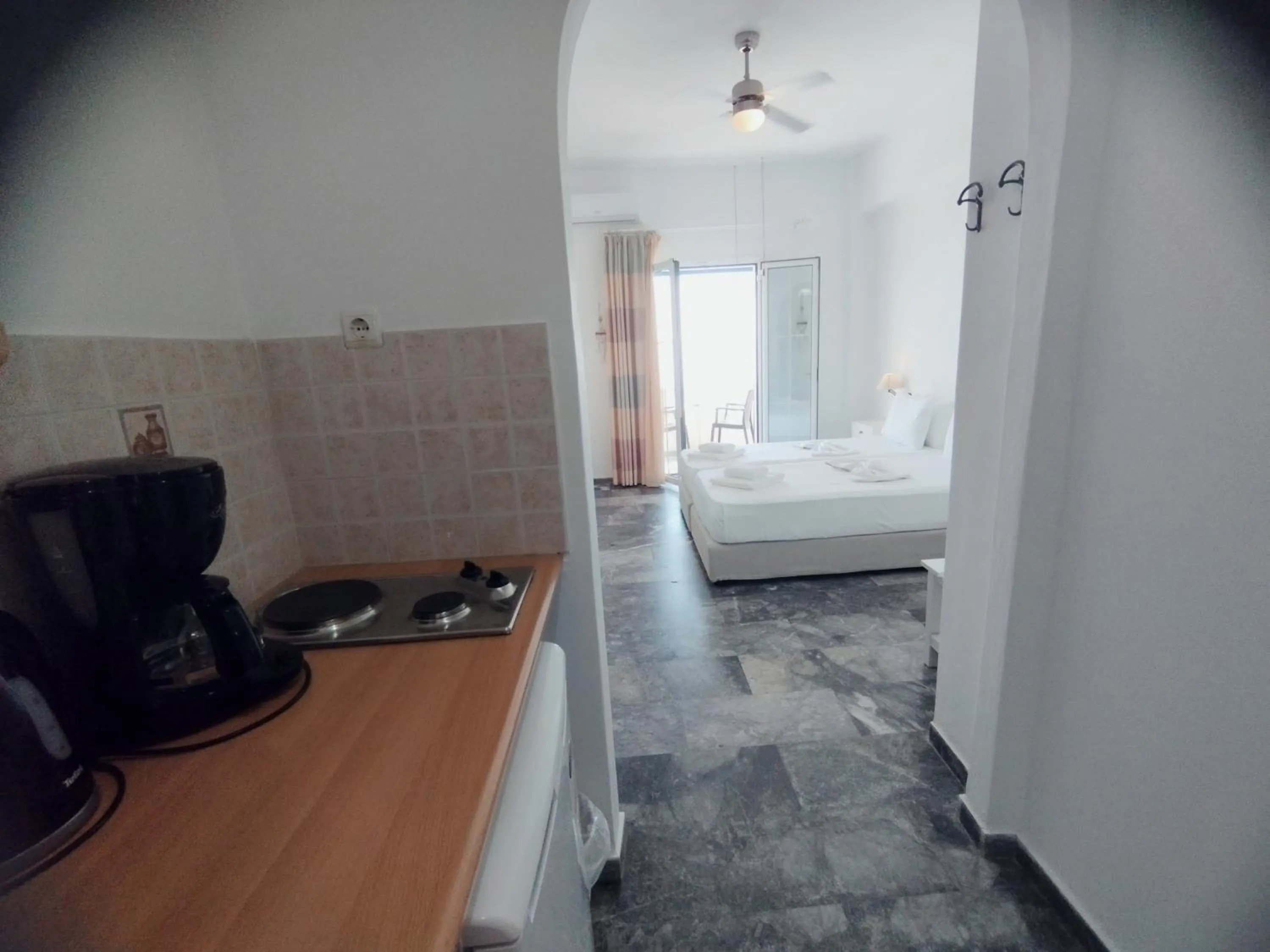 Kitchen or kitchenette, Bed in Marisini Sea View