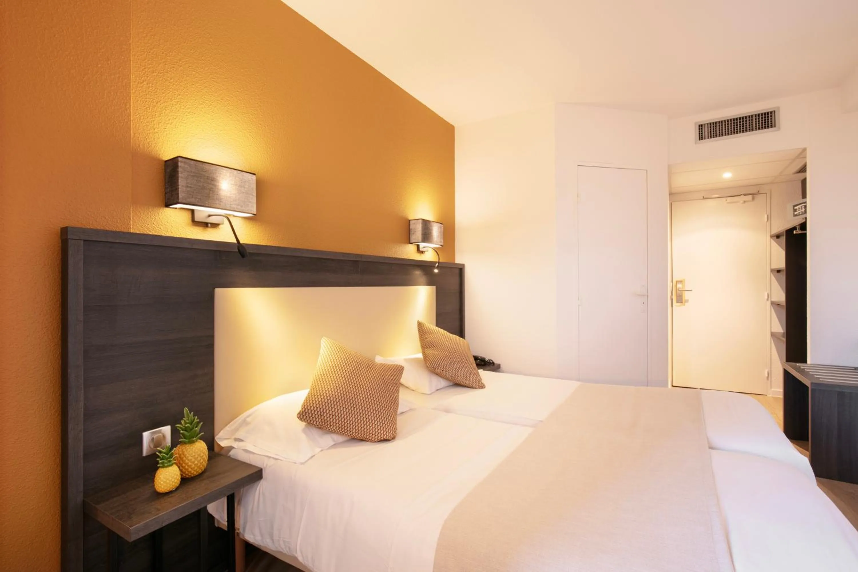 Bed in Hôtel Le Collier