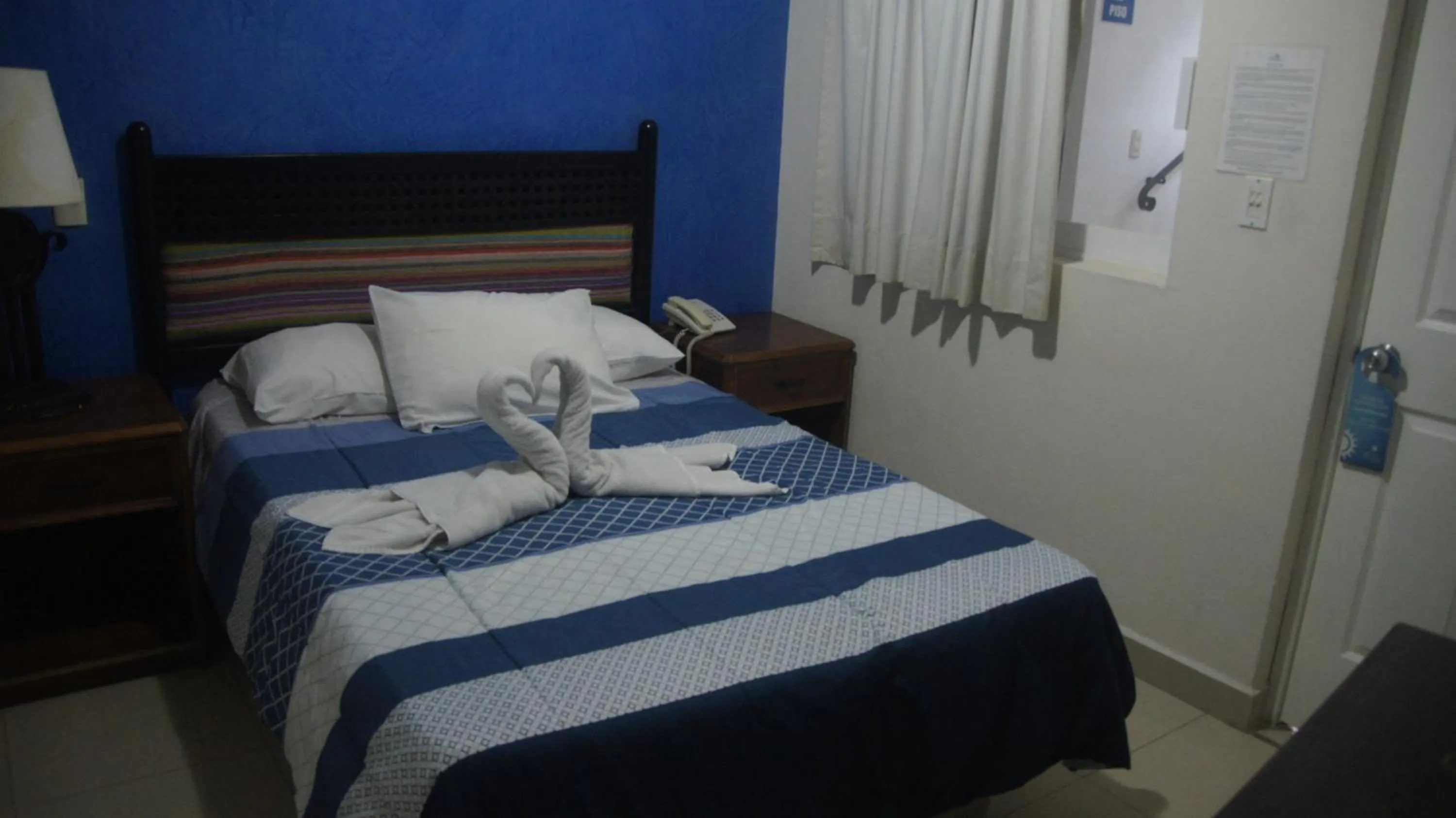 Bed in Casa del Parque Vallarta