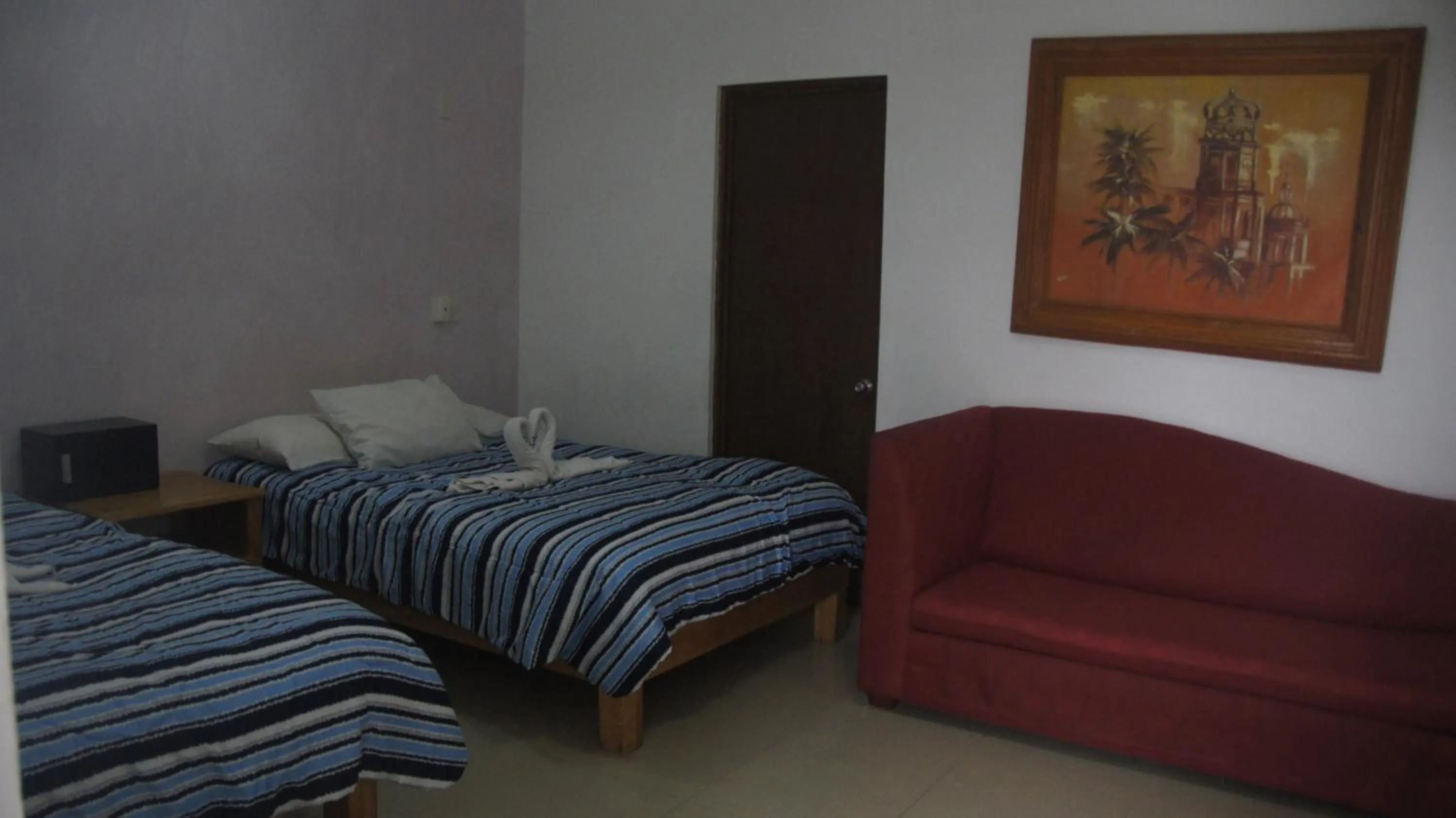 Bed in Casa del Parque Vallarta