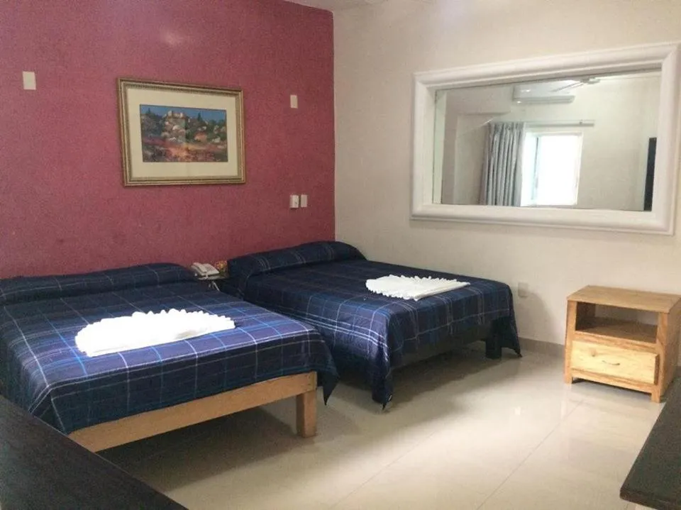 Bed in Casa del Parque Vallarta