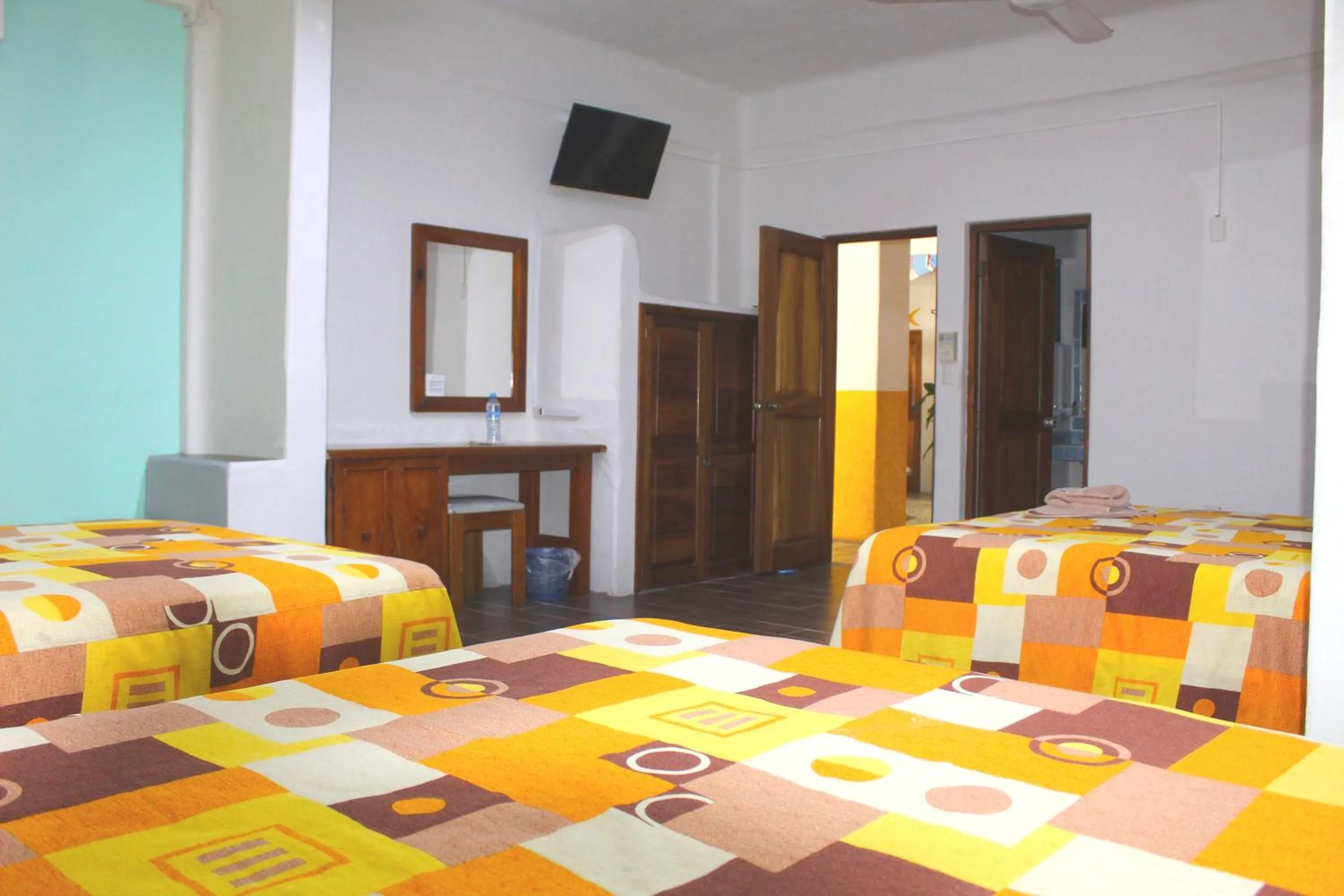 Photo of the whole room, Bed in Hotel Arrecife Huatulco Plus