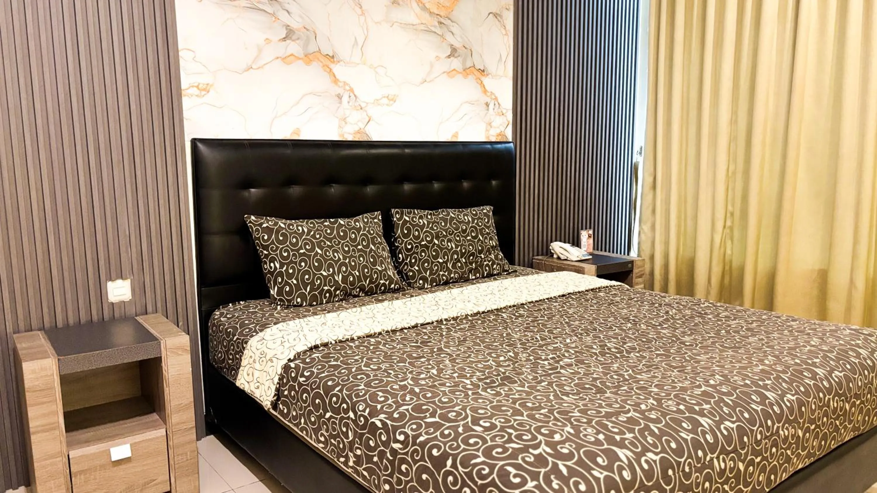 Bed in UTC Hotel Semarang