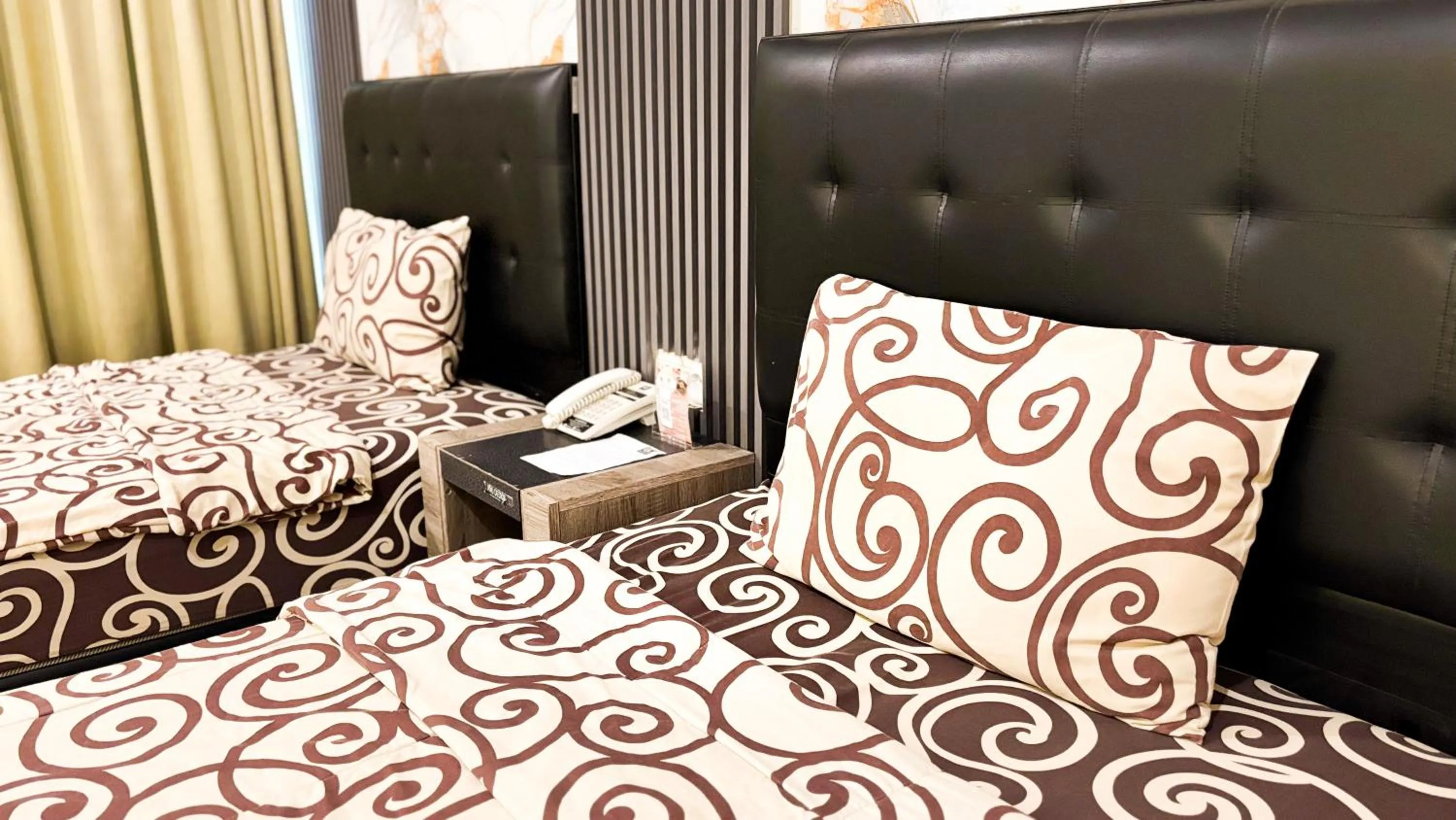 Bed in UTC Hotel Semarang