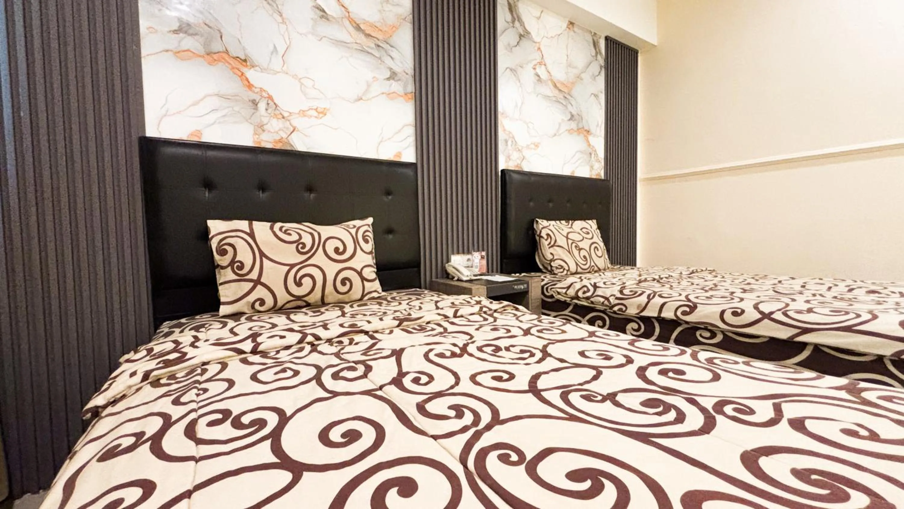 Bed in UTC Hotel Semarang