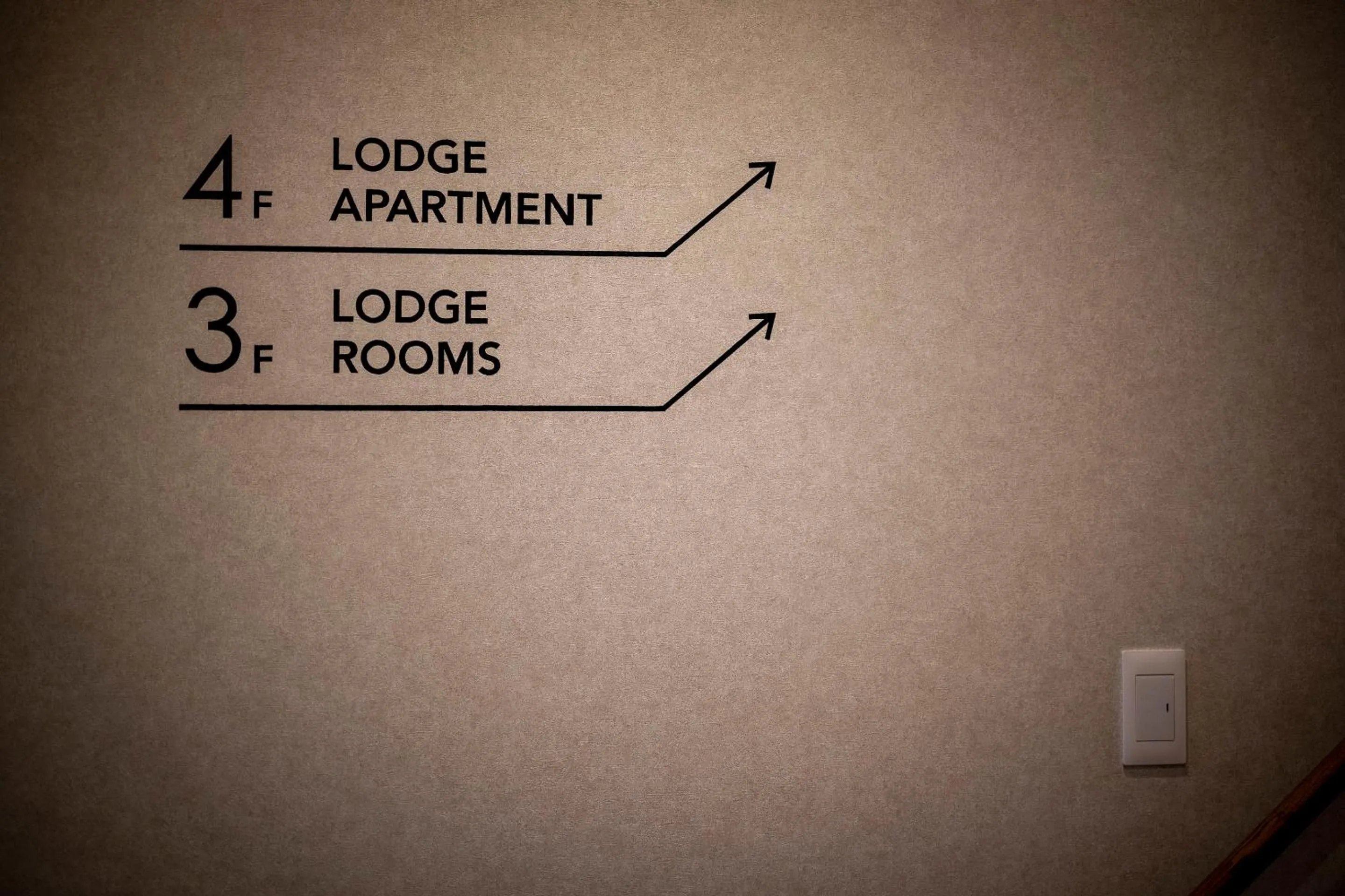 Property logo or sign in Tanuki Nozawa