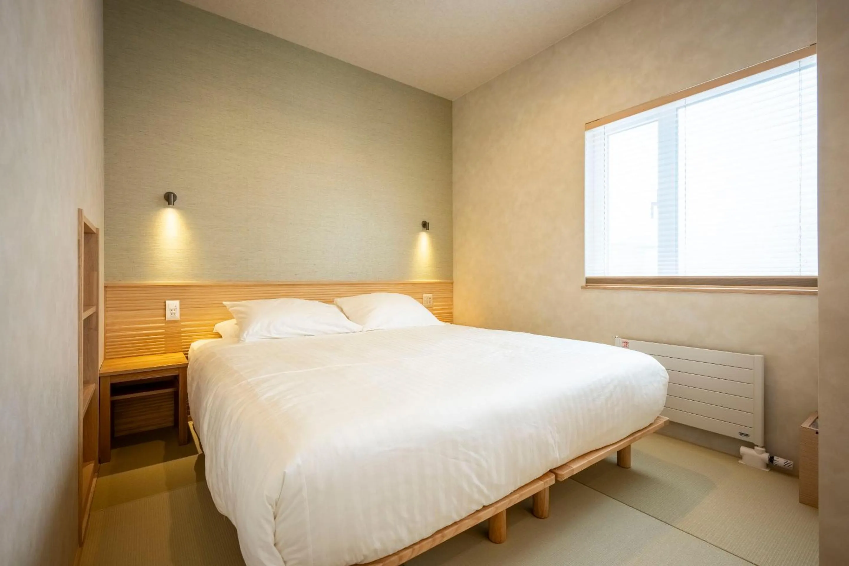 Bed in Tanuki Nozawa