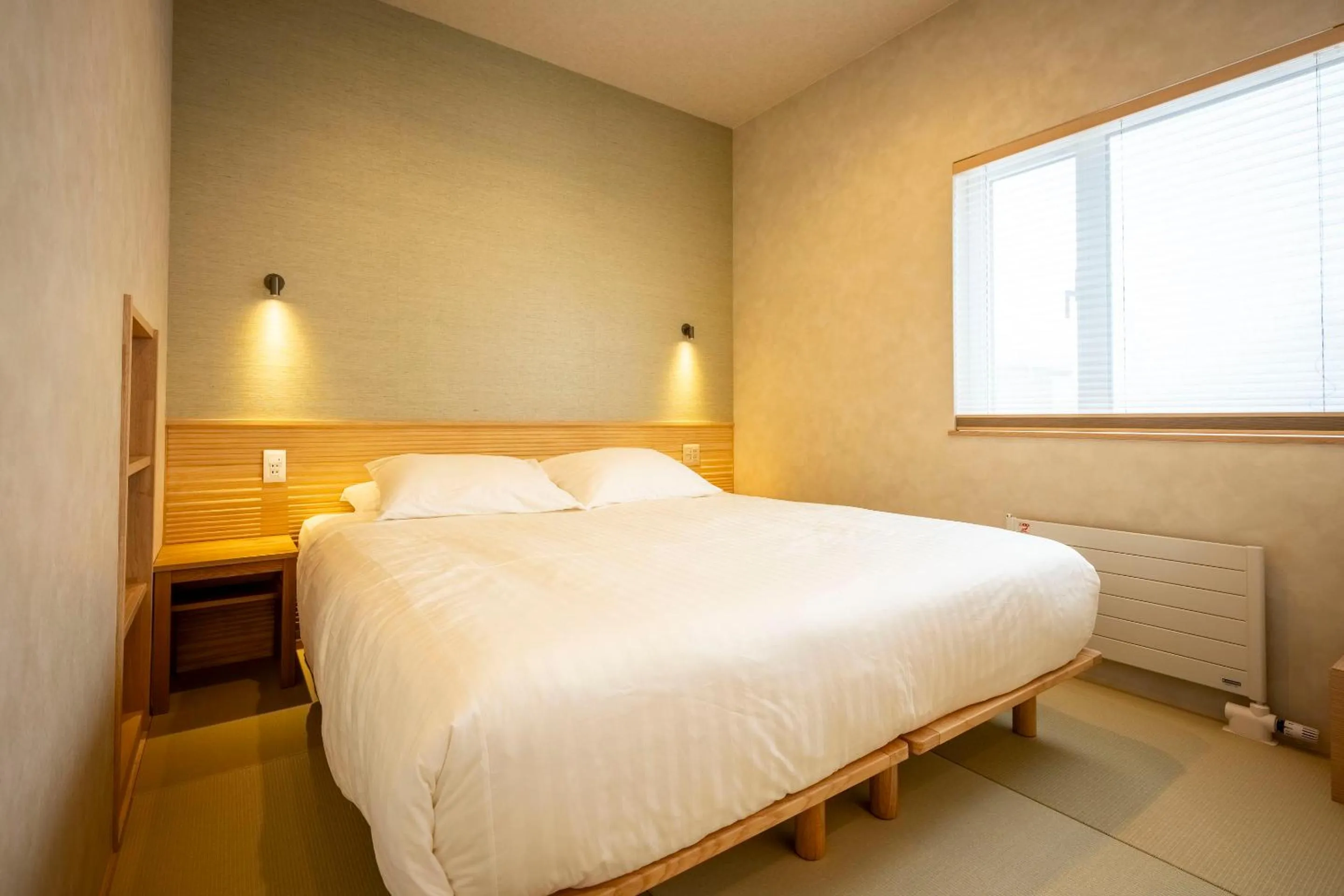 Bed in Tanuki Nozawa