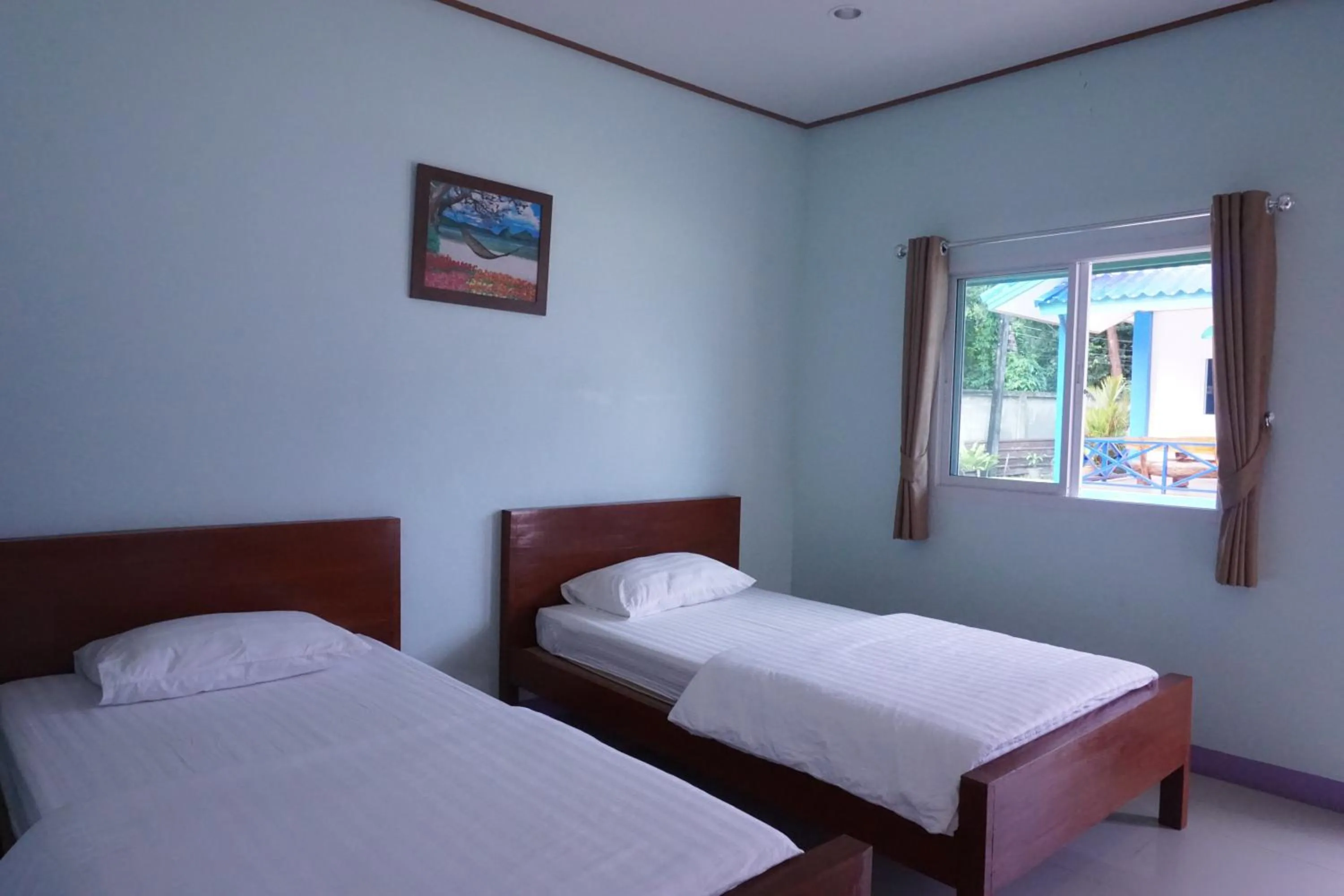 Bed in Anyamanee Resort Trat