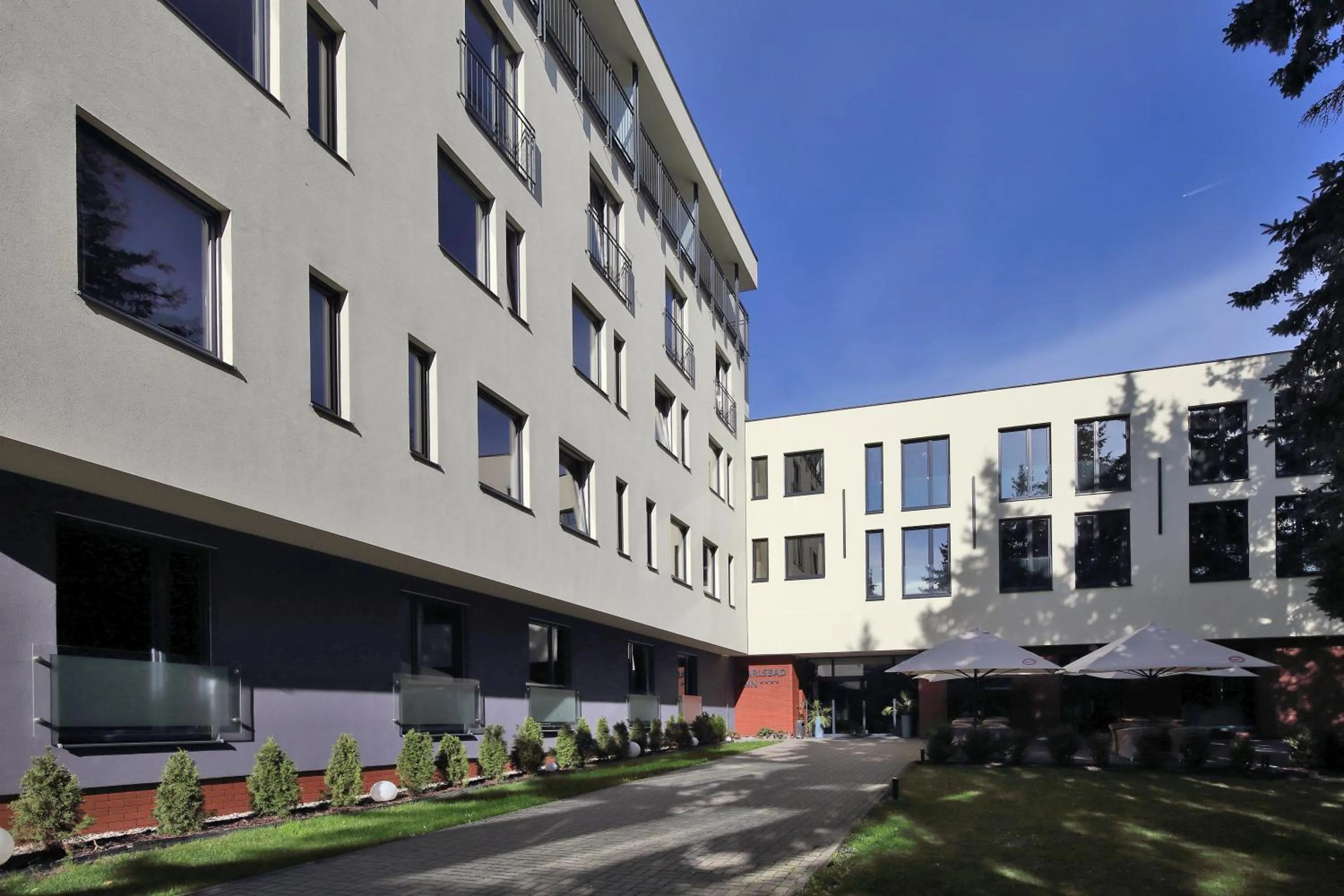 Property building in Carlsbad INN hotel & apartments