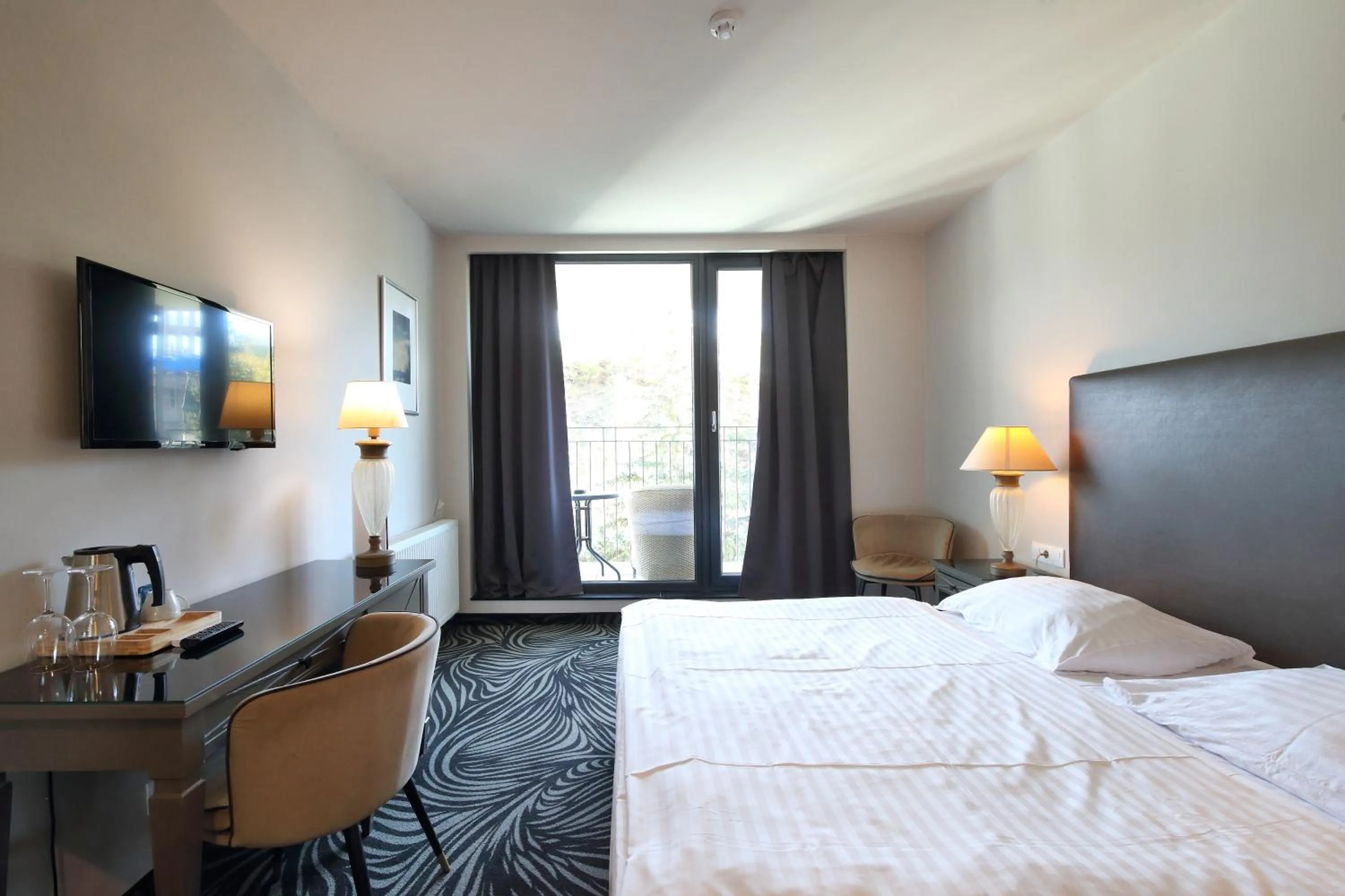 View (from property/room), Bed in Carlsbad INN hotel & apartments