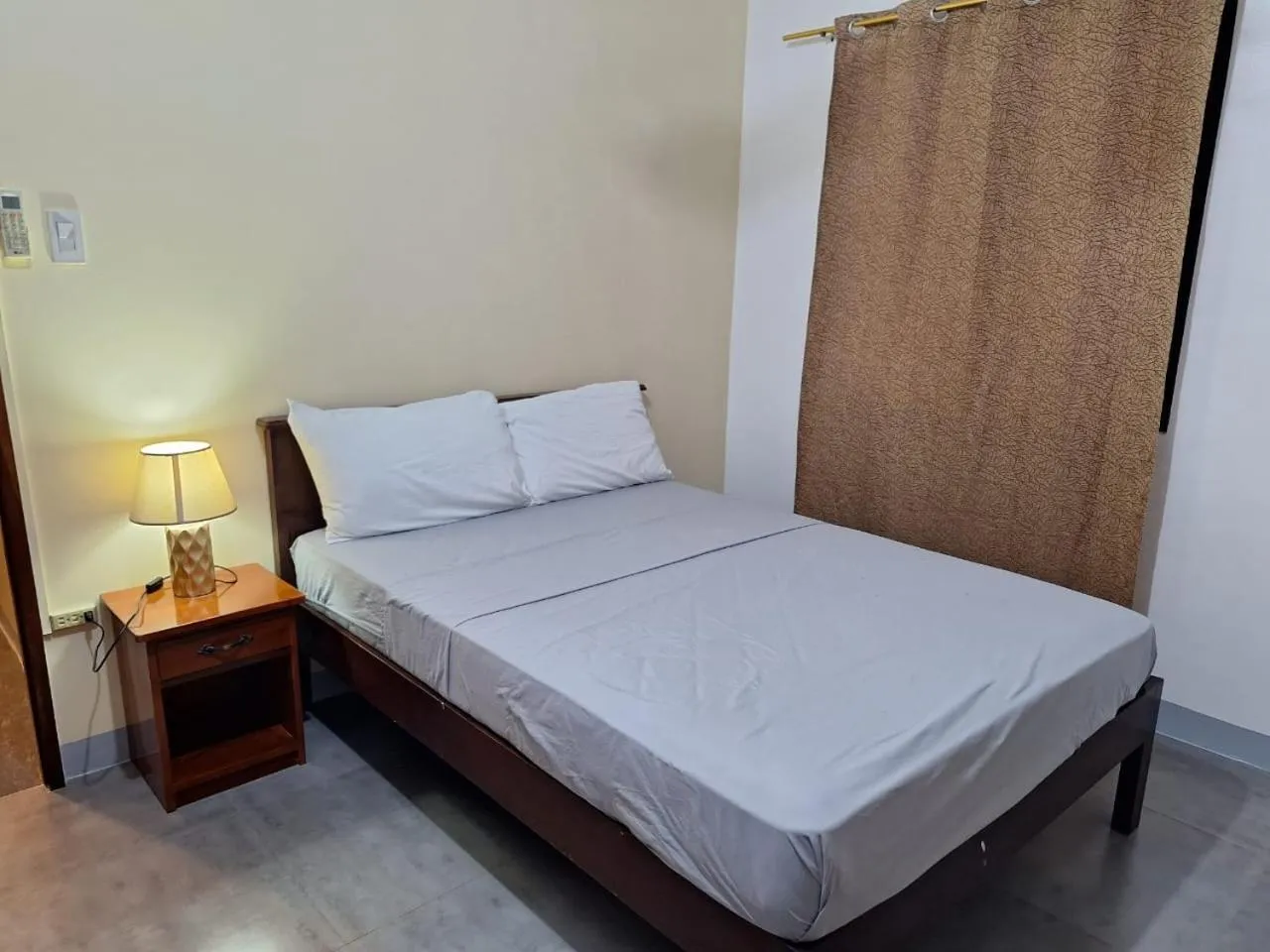 Bed in Garden Village Resort