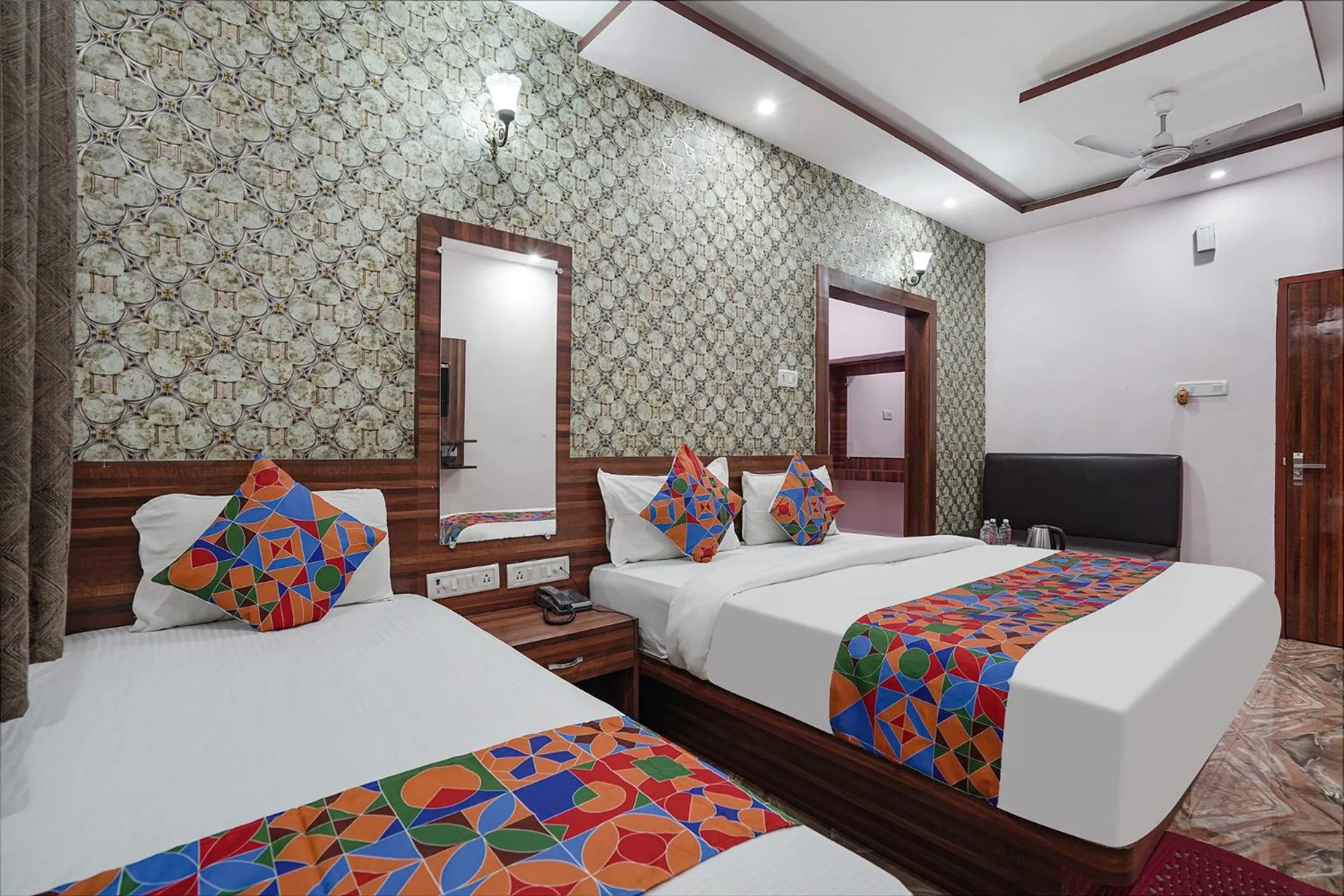 Bed in FabHotel Deepak Palace