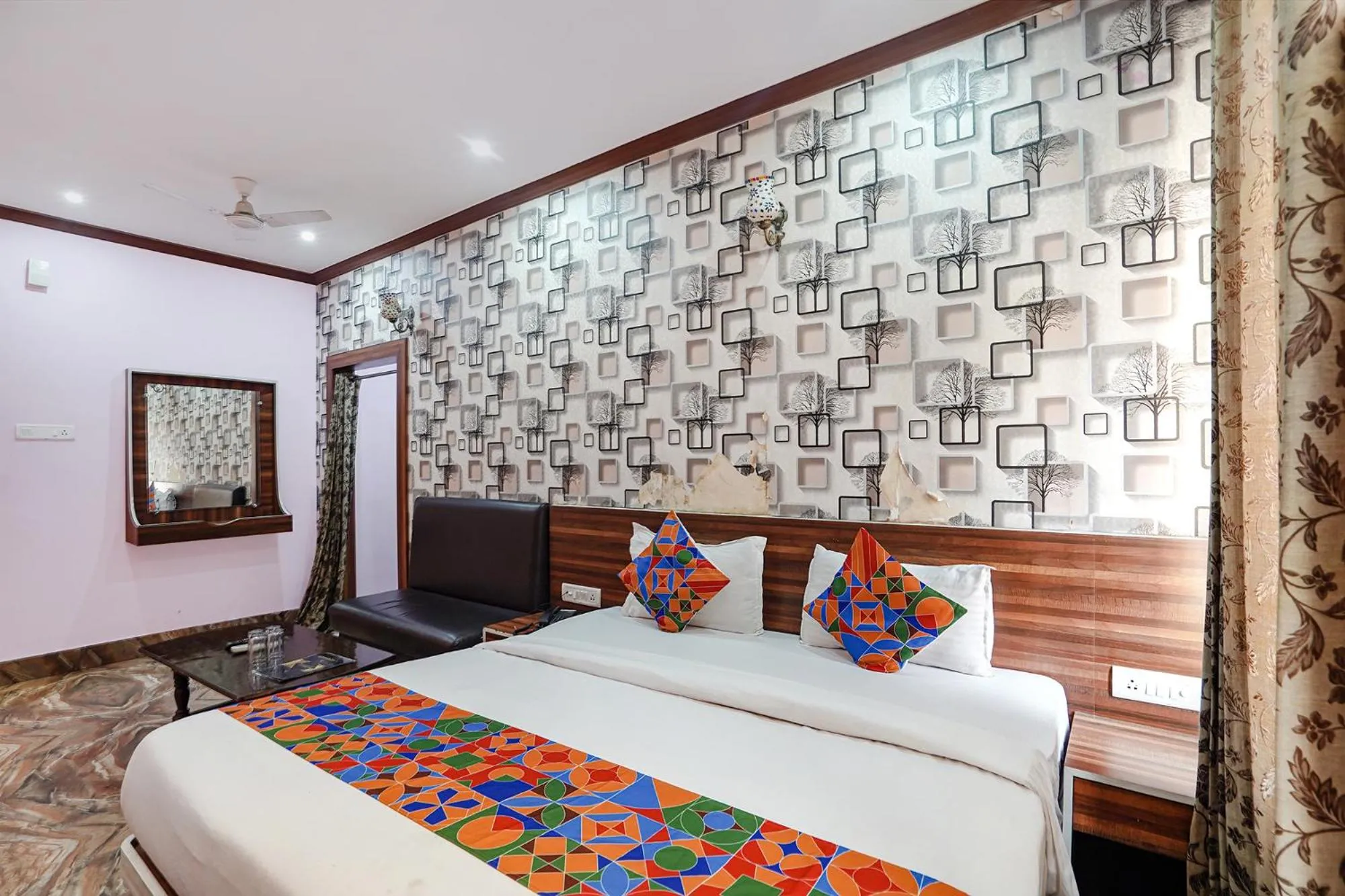 Bed in FabHotel Deepak Palace