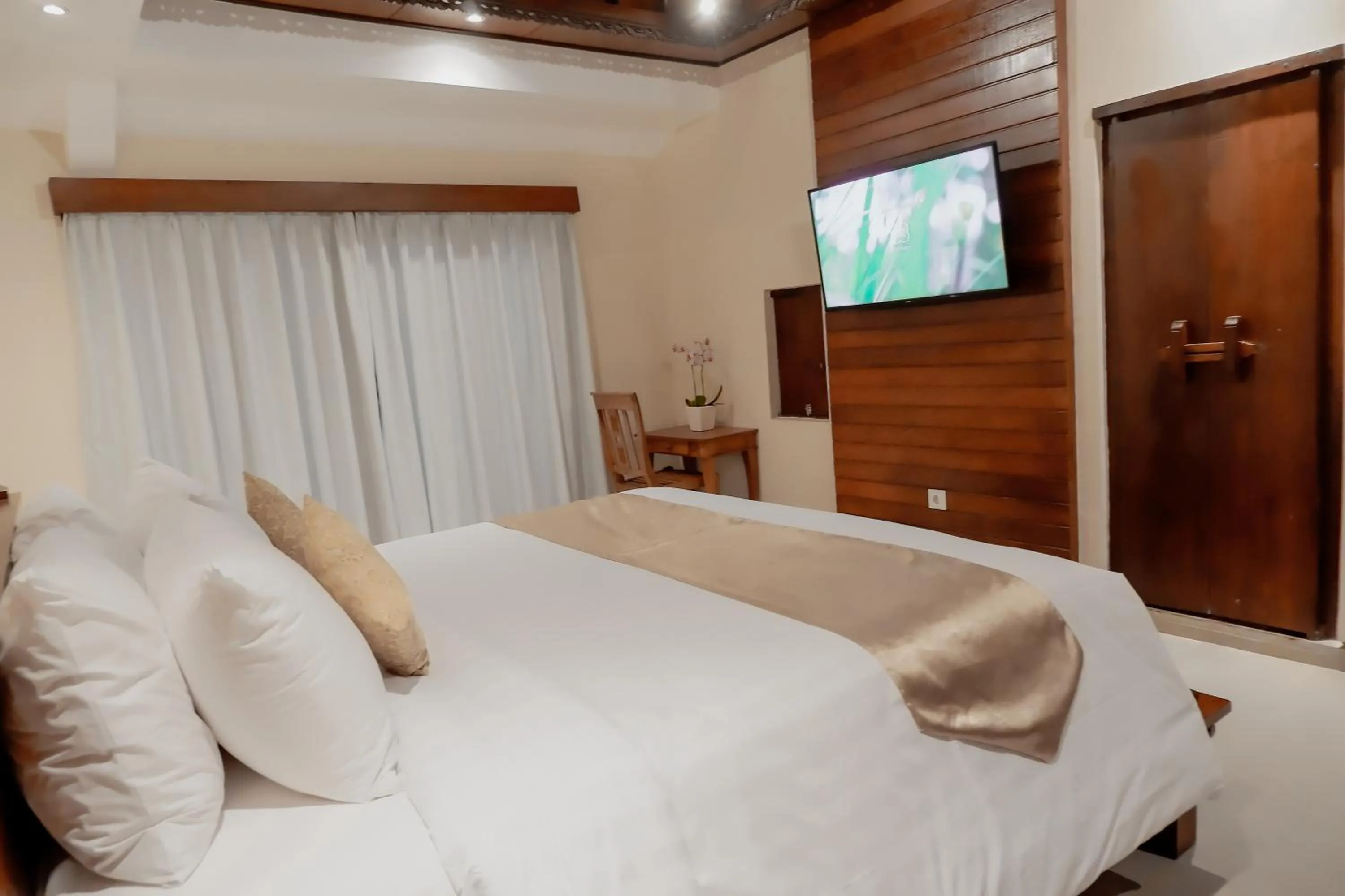 Bed in Mas Ubud Villa by Sanga Sanga Hospitality