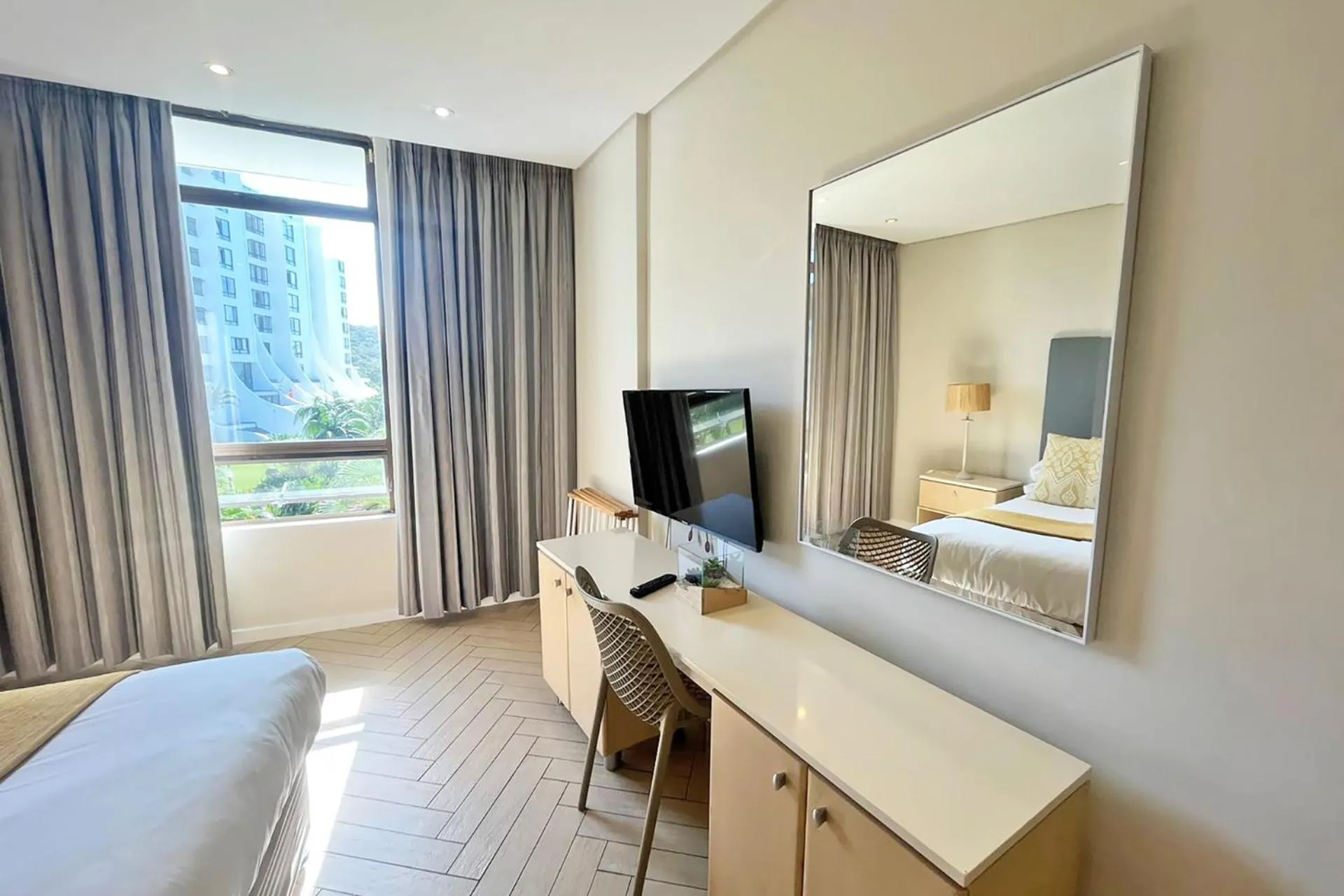 Garden view, Bed in First Group Breakers Resort - Official