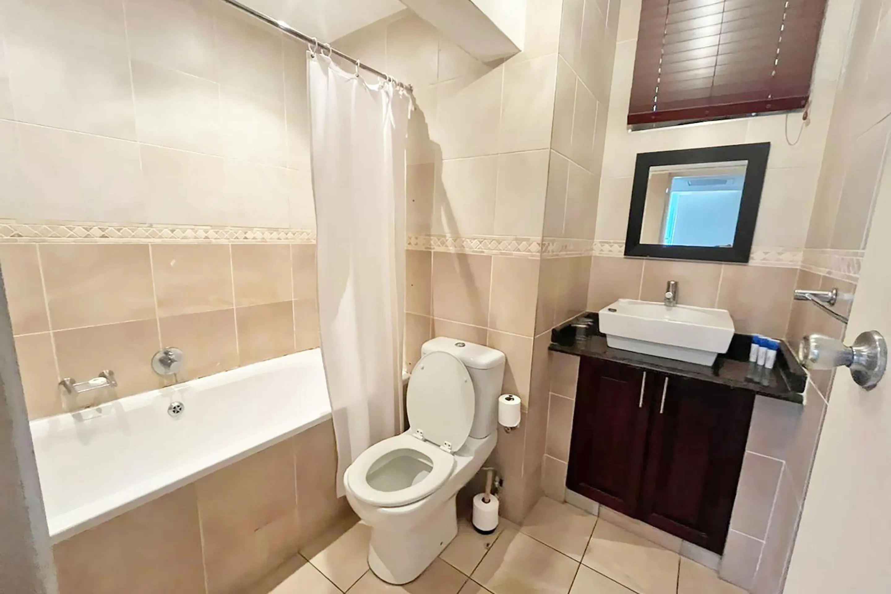 Bathroom in First Group Breakers Resort - Official