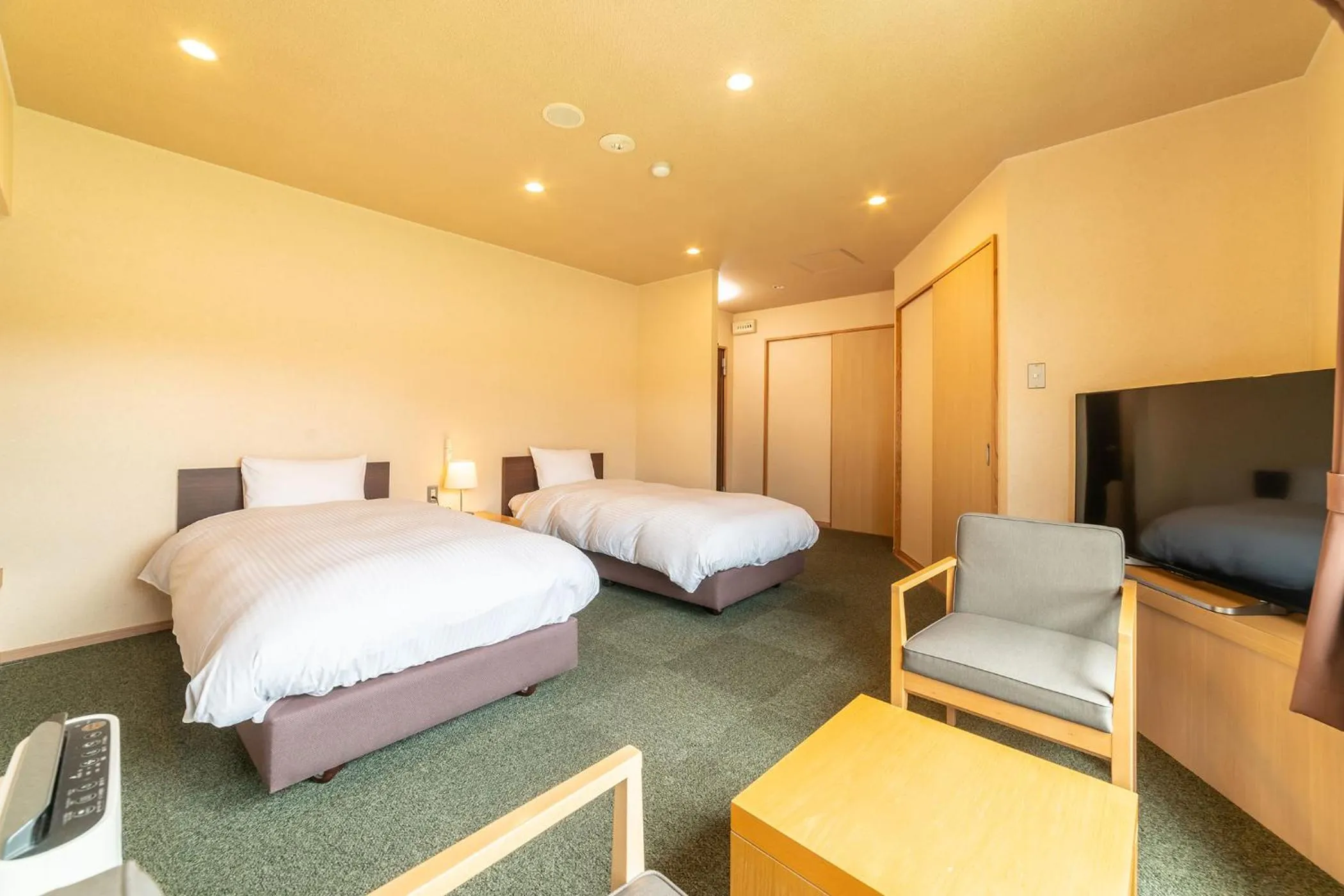 Photo of the whole room, Bed in Ooedo Onsen Monogatari Premium Kinosaki
