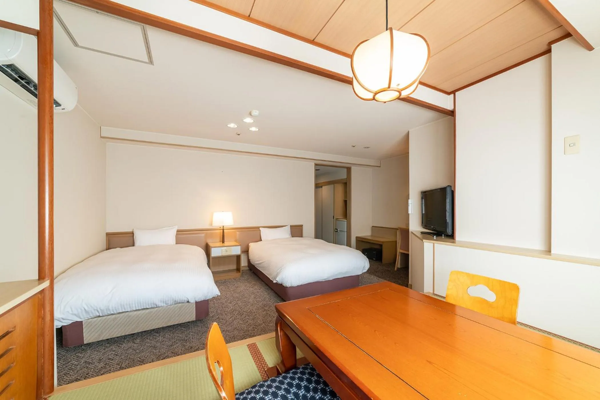 Photo of the whole room, Bed in Ooedo Onsen Monogatari Premium Kinosaki