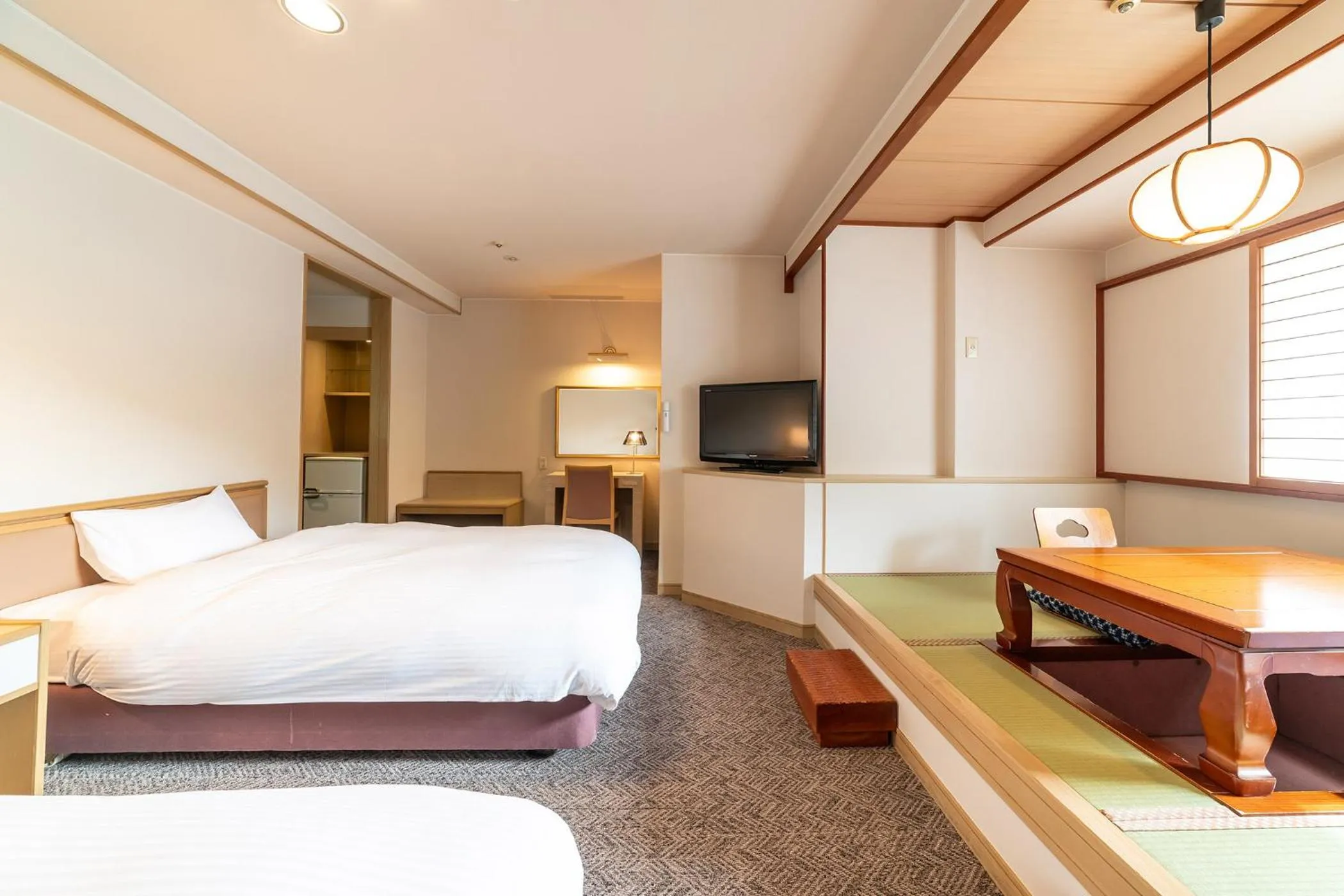 Photo of the whole room, Bed in Ooedo Onsen Monogatari Premium Kinosaki
