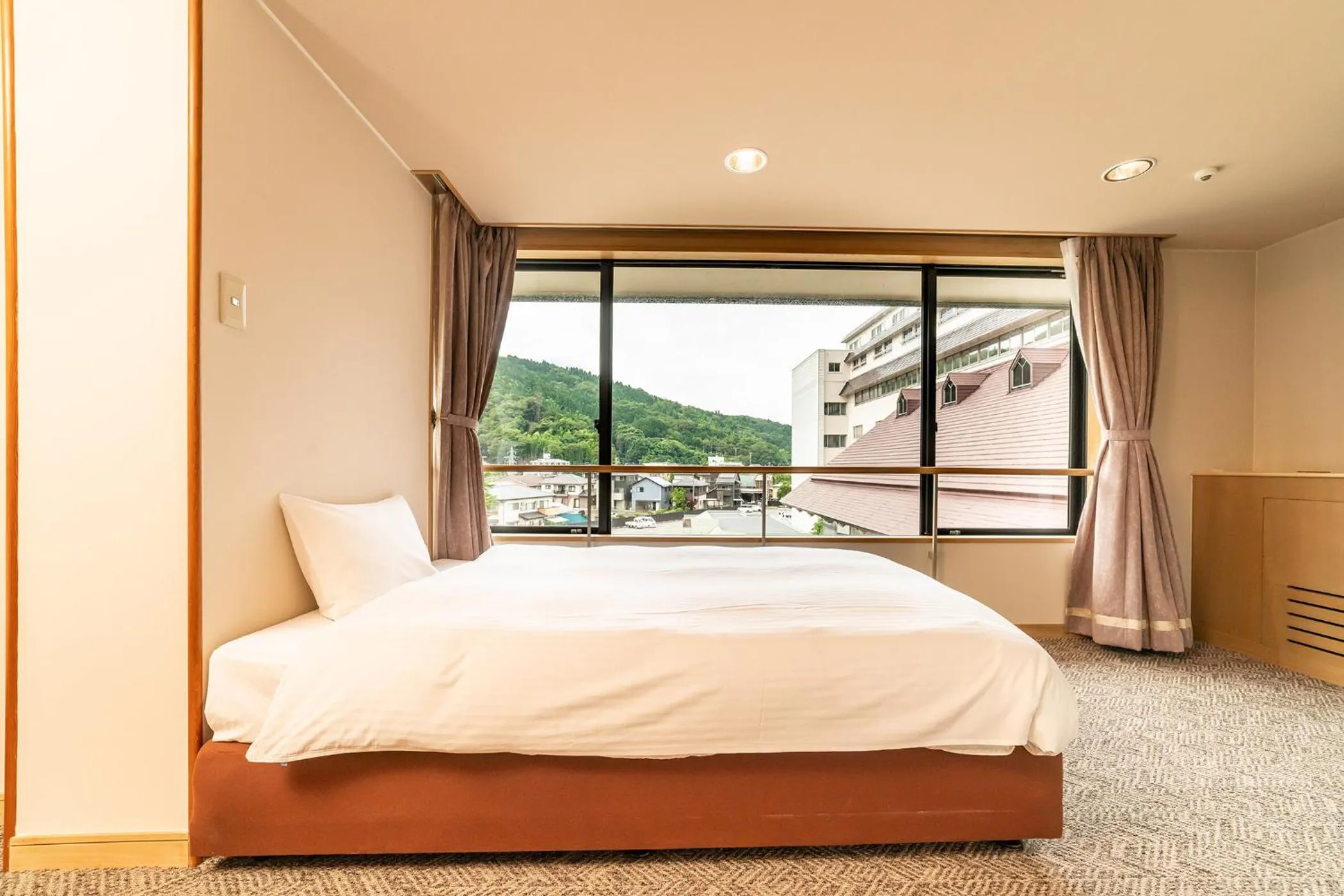 Photo of the whole room, Bed in Ooedo Onsen Monogatari Premium Kinosaki