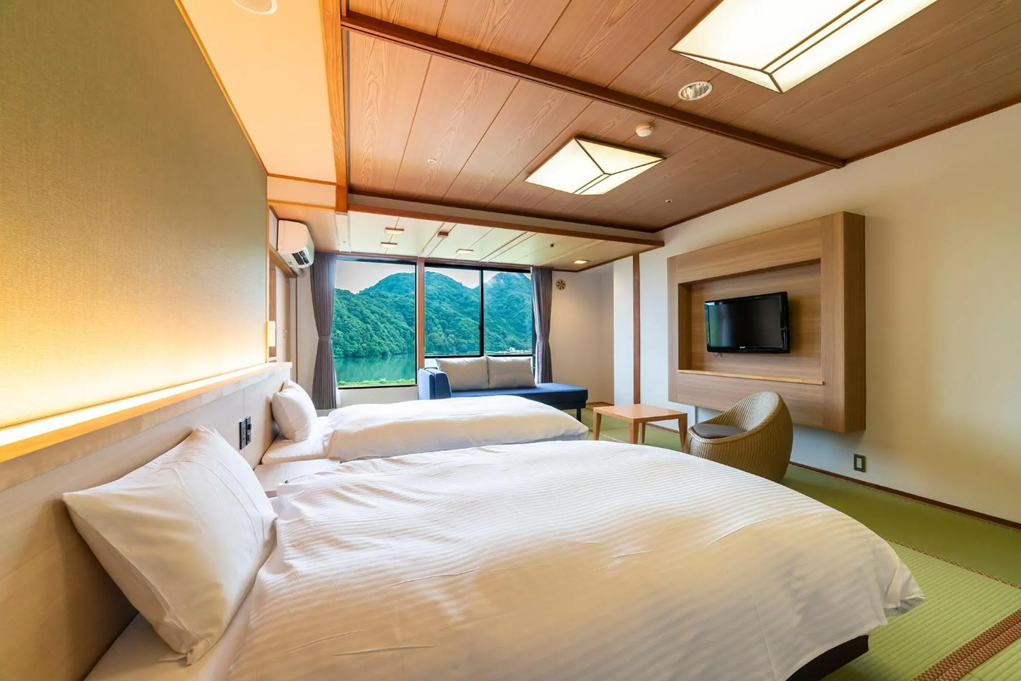 Photo of the whole room, Bed in Ooedo Onsen Monogatari Premium Kinosaki