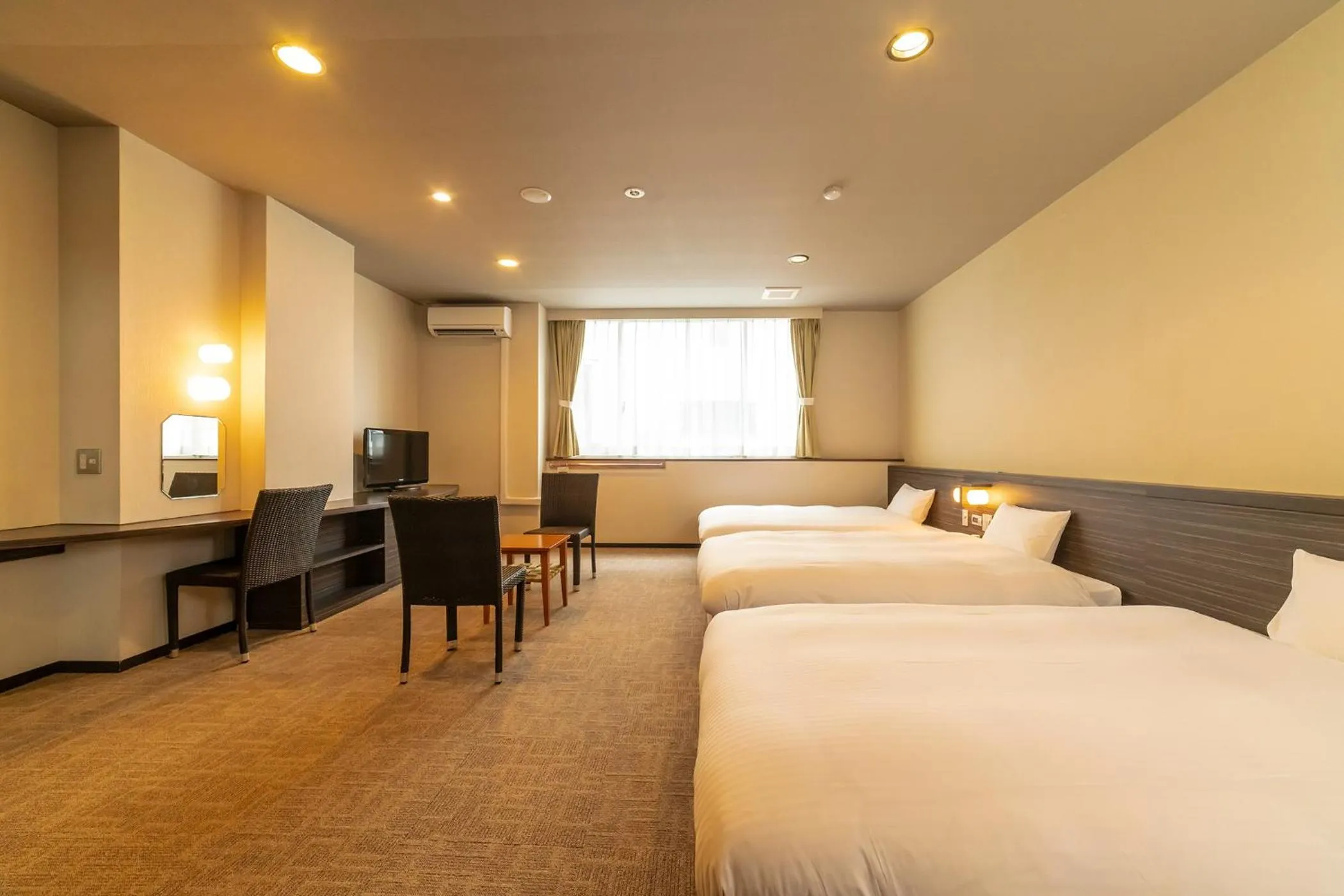 Photo of the whole room, Bed in Ooedo Onsen Monogatari Premium Kinosaki