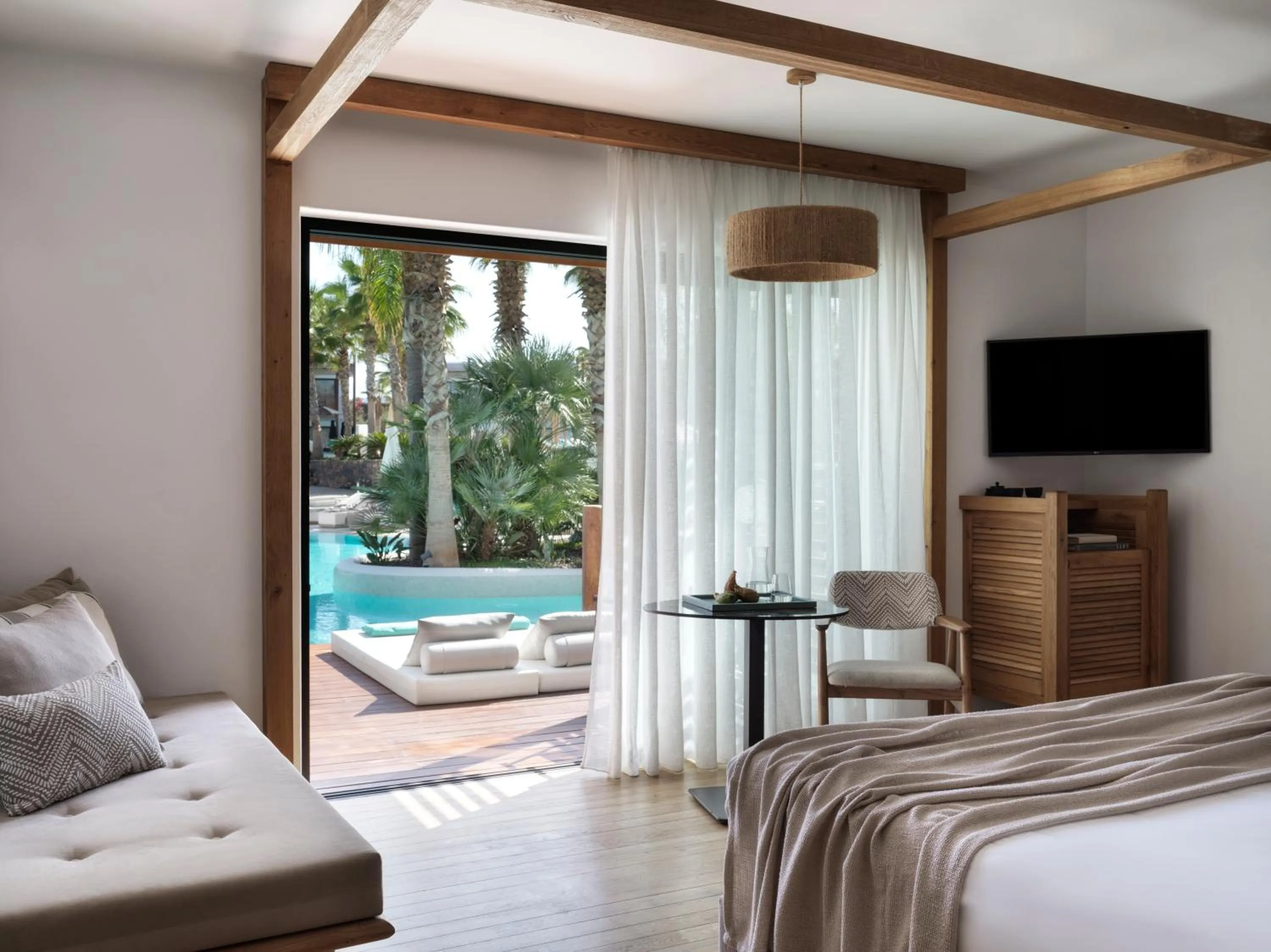 Bed in Stella Island Luxury Resort & Spa (Adults Only)