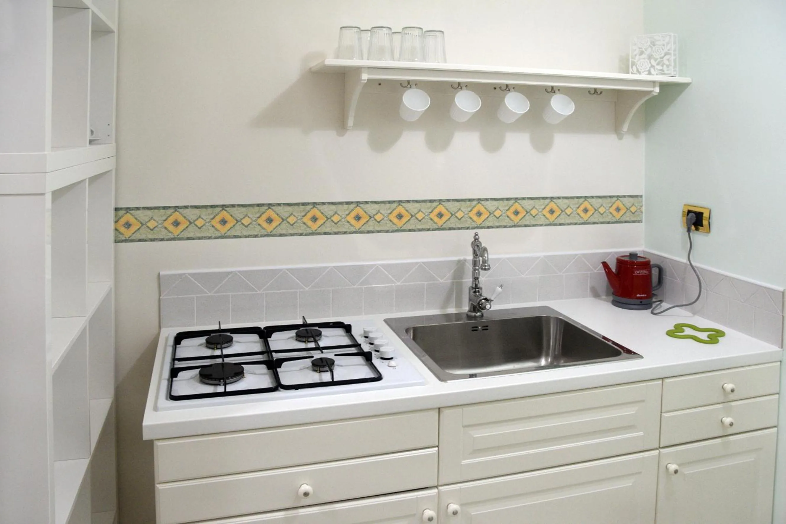 Kitchen or kitchenette in Luciano And Son