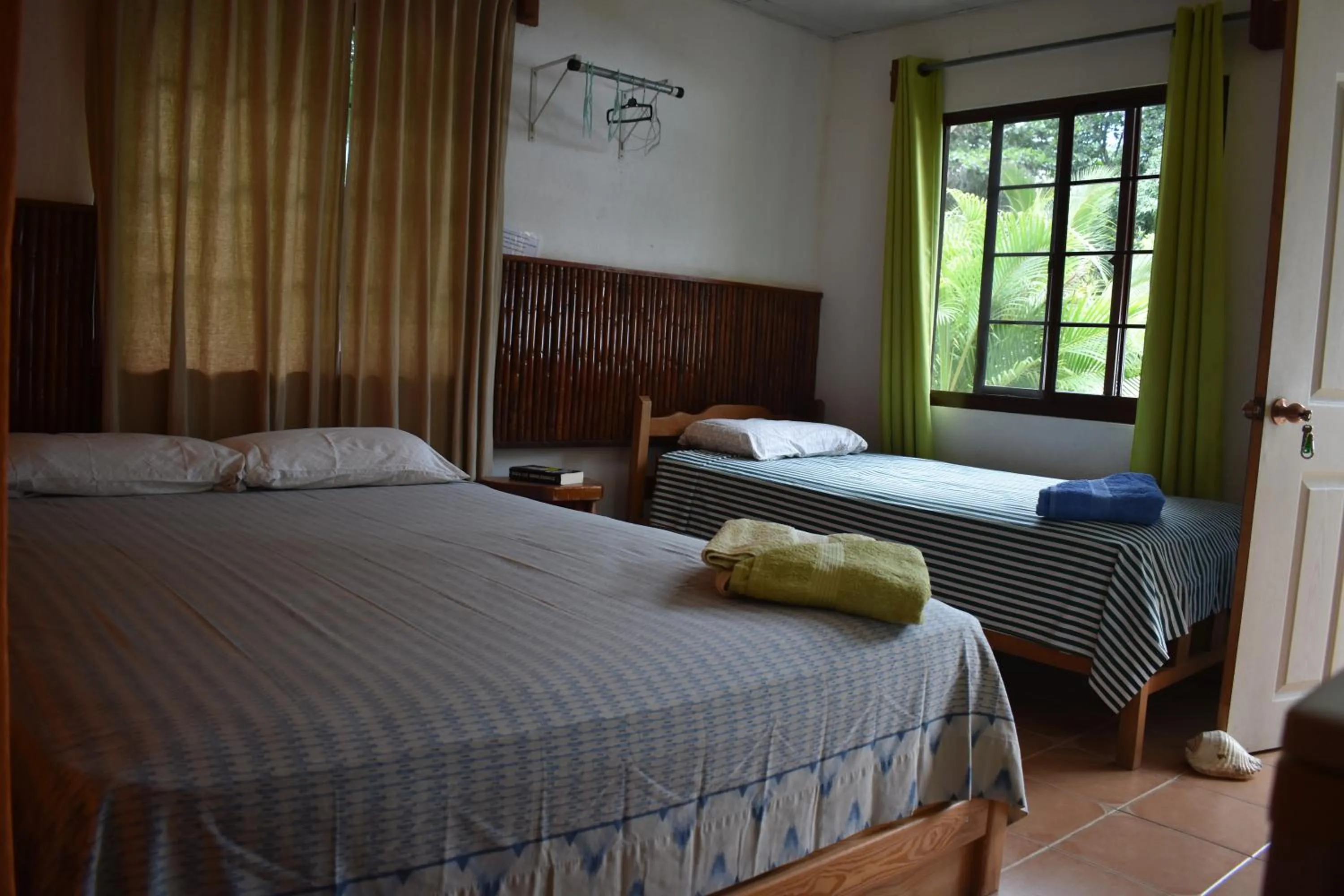 Bedroom, Bed in Rainforest Yasmin Hotel