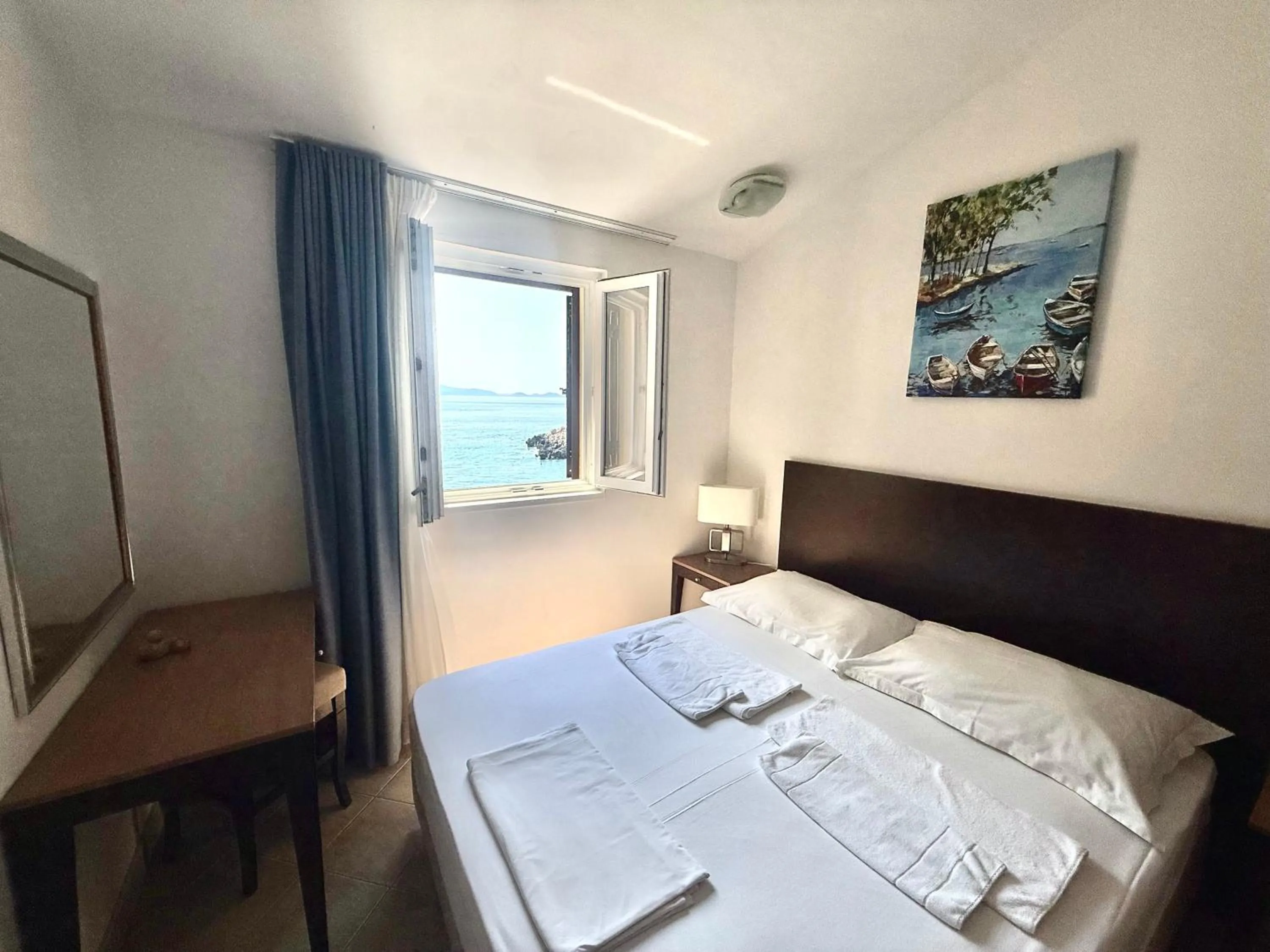 Bedroom, Bed in Hotel Priscapac Resort & Apartments