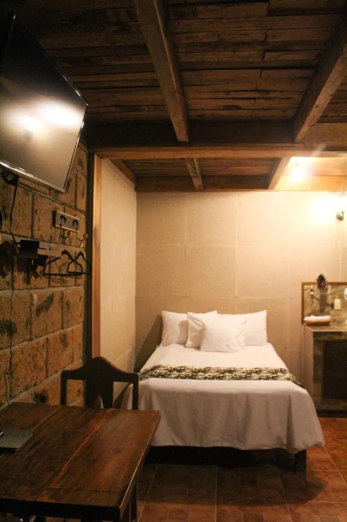 Bed in Hotel Real Nirvana