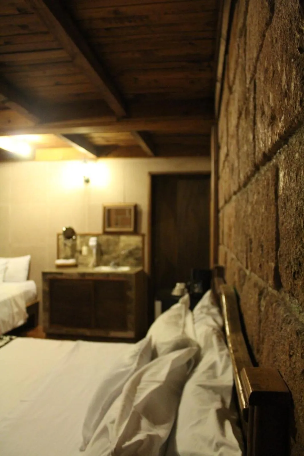 Bed in Hotel Real Nirvana