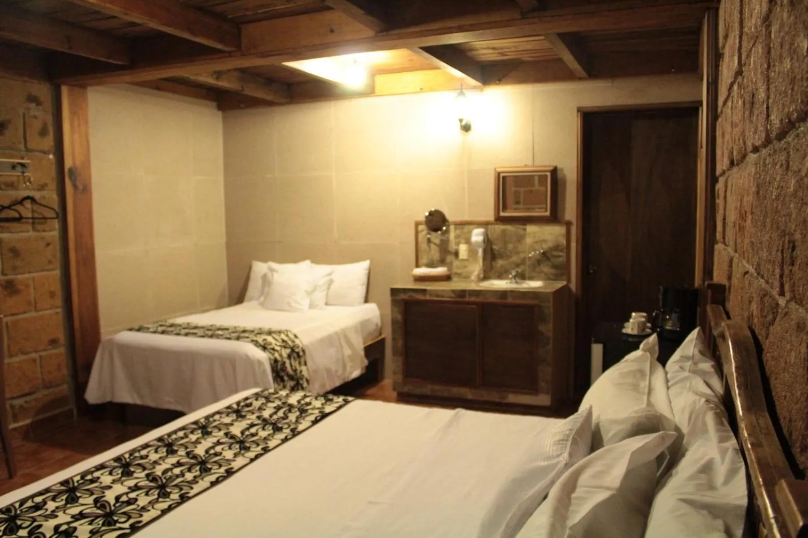 Bed in Hotel Real Nirvana