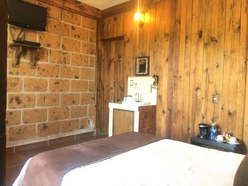 Bed in Hotel Real Nirvana