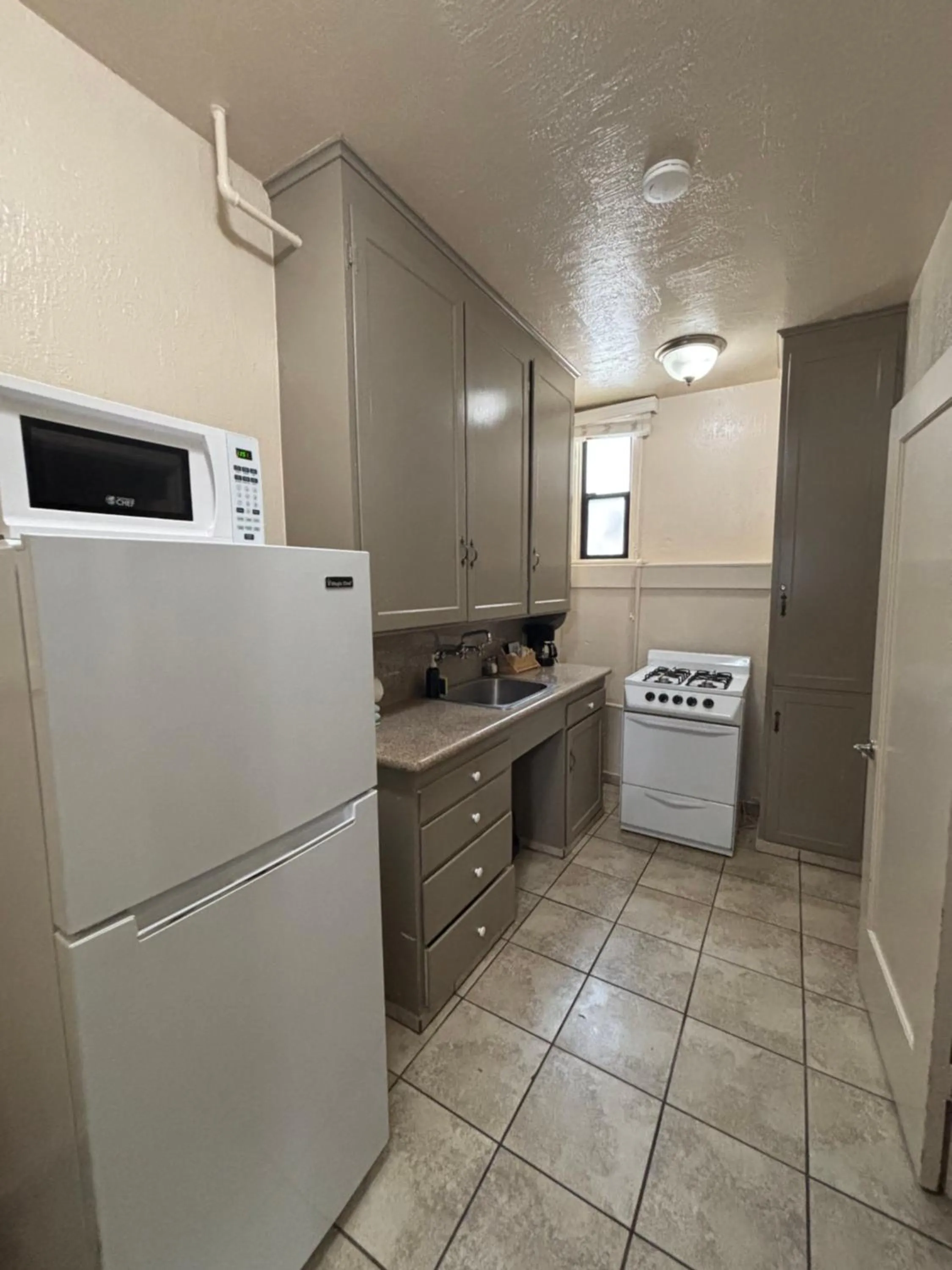 Kitchen or kitchenette in Capitola Venetian Vacation Rentals