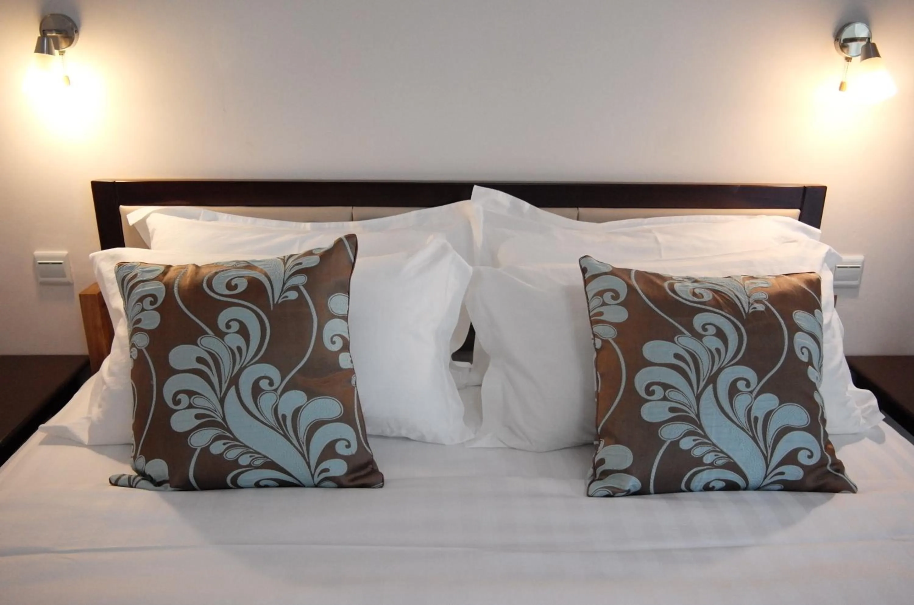 Bed in Luganvilla Business Hotel and Restaurant