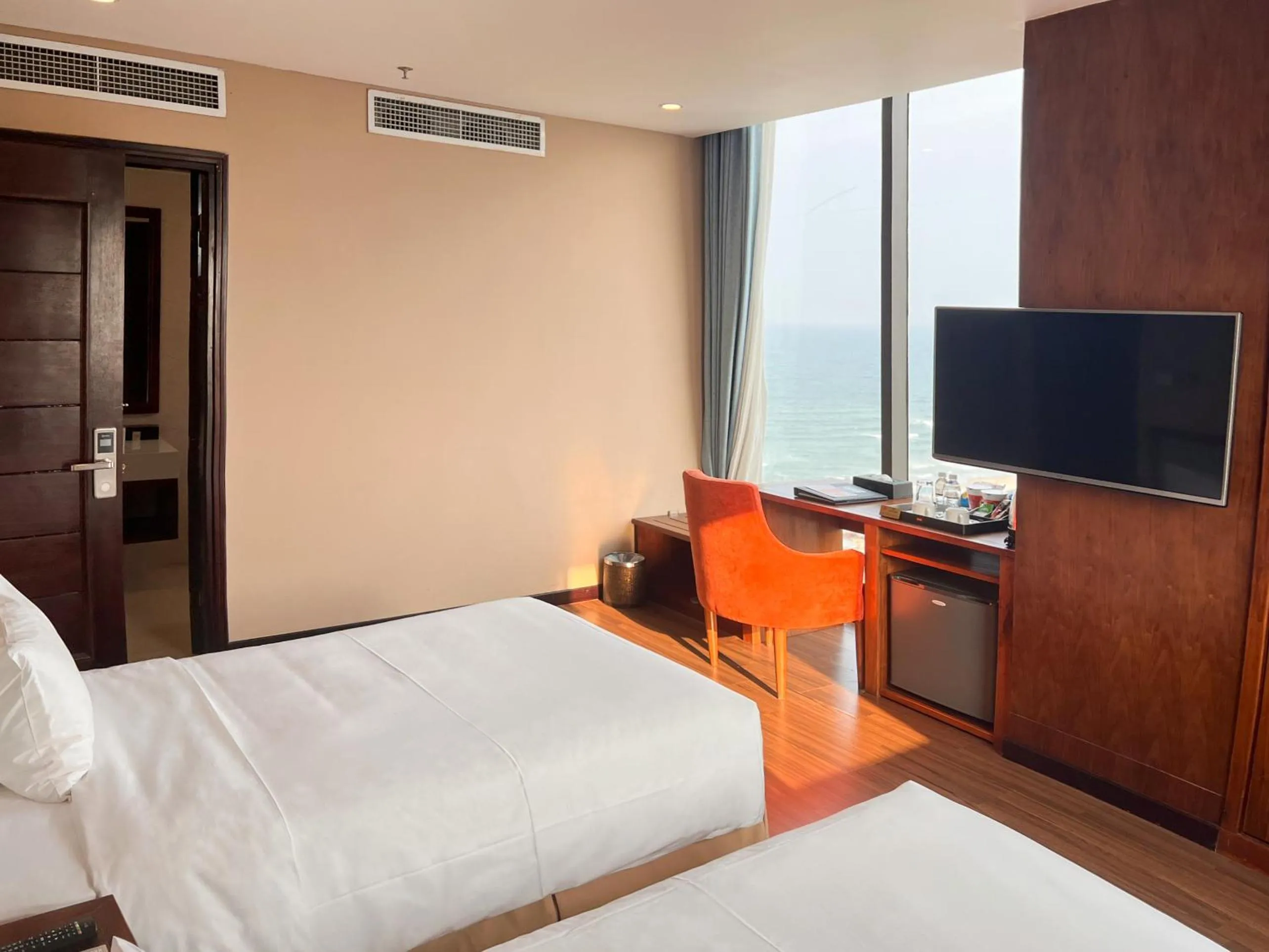 Bed in Yarra Ocean Suites Danang