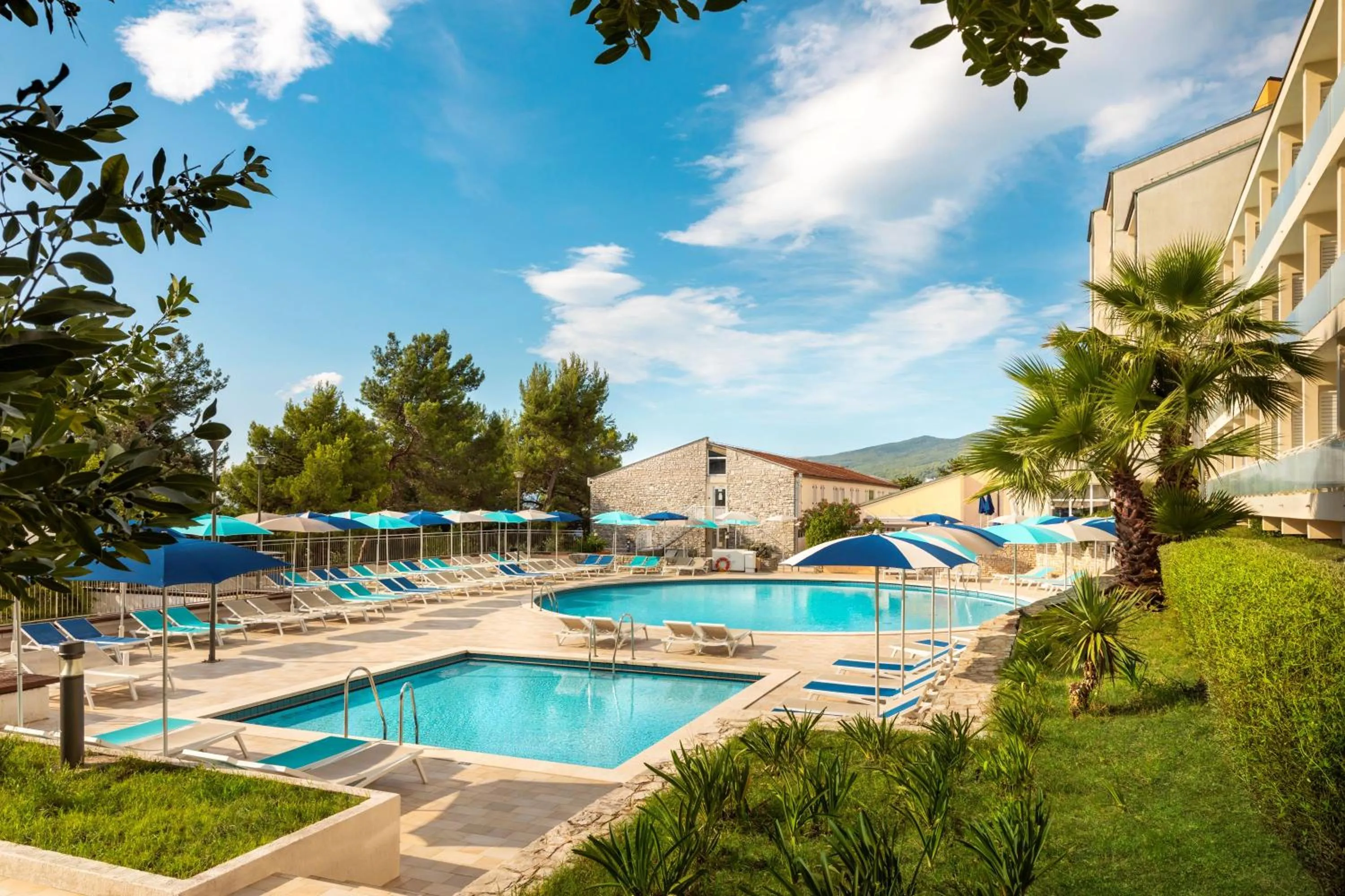 Swimming pool in Sunny Rabac by Valamar
