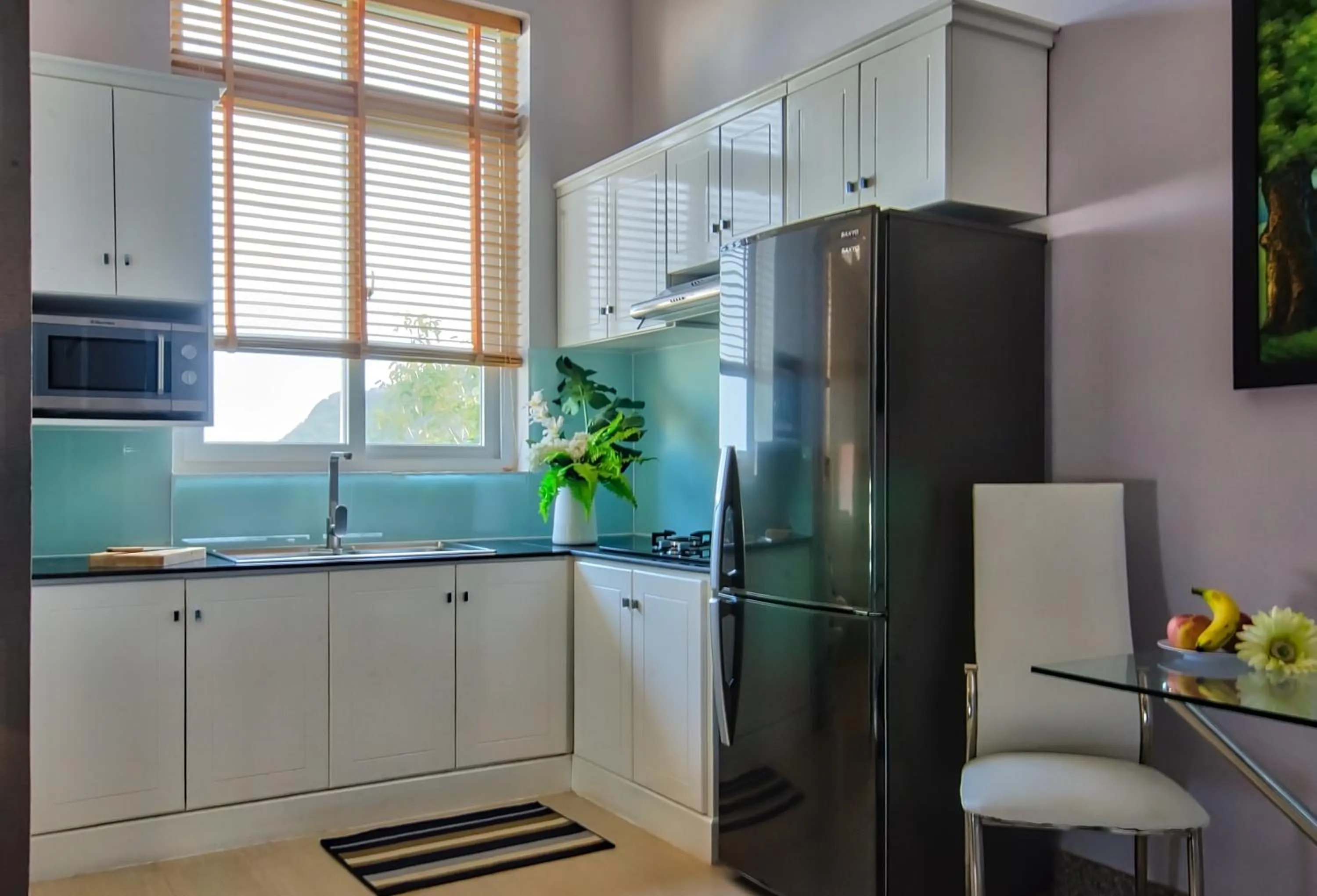 Kitchen or kitchenette in The Wind Resort - Tropical Hillside Escape
