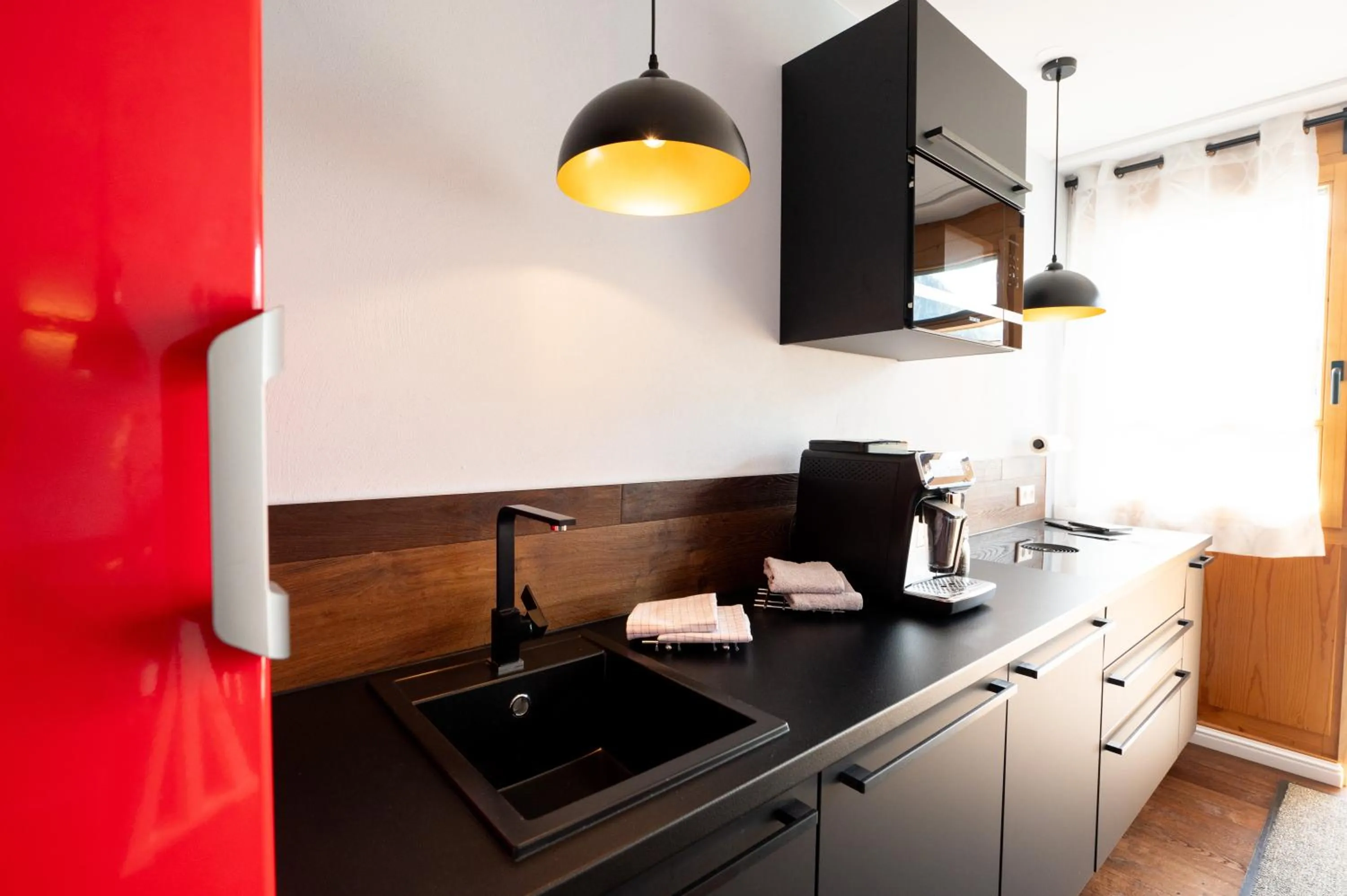 Kitchen or kitchenette in ALPENLIEBE - Sauna & Whirlpool - APARTments