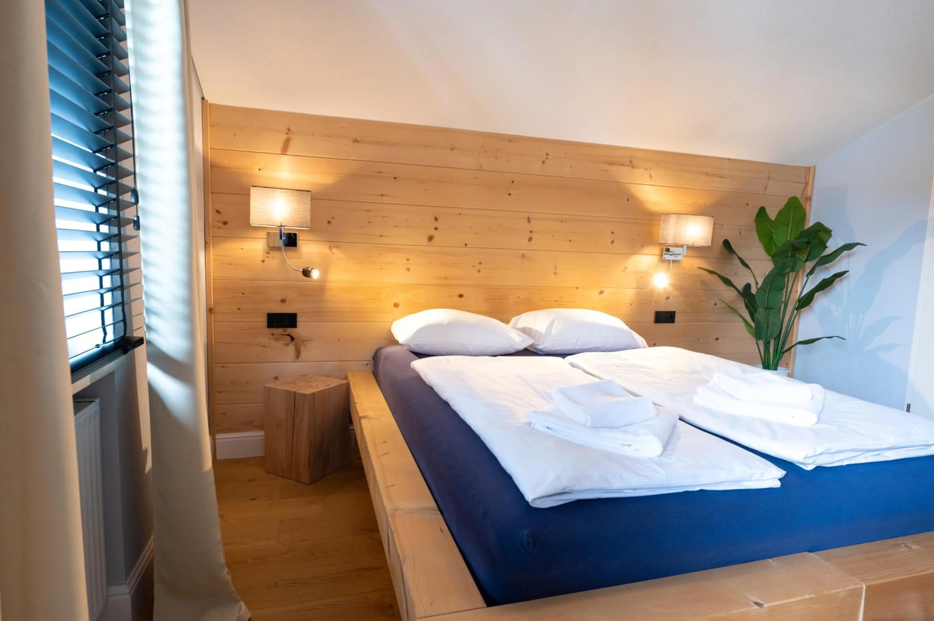 Bedroom, Bed in ALPENLIEBE - Sauna & Whirlpool - APARTments