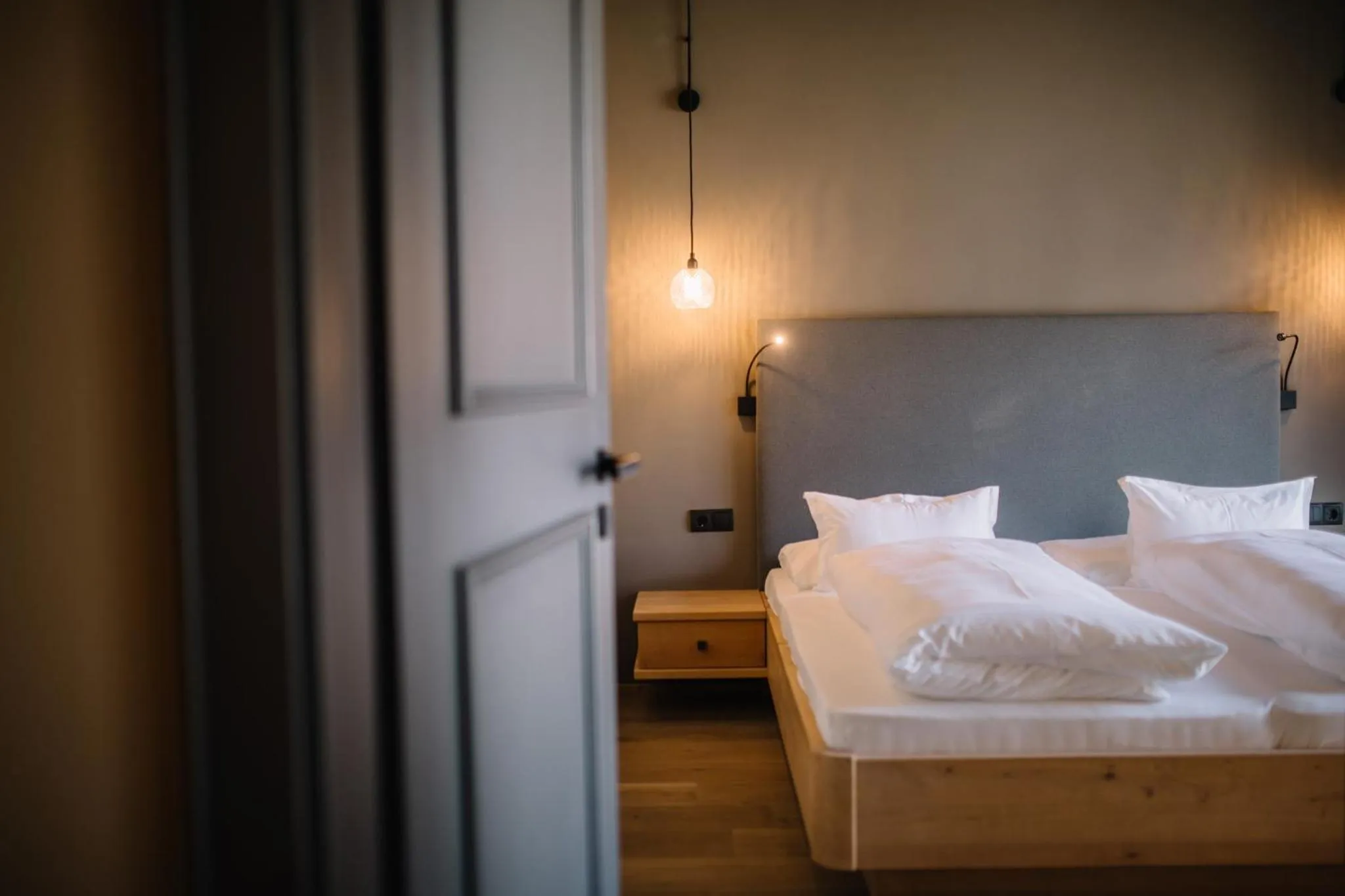 Bed in Panoramic Suites Winzerhöhe