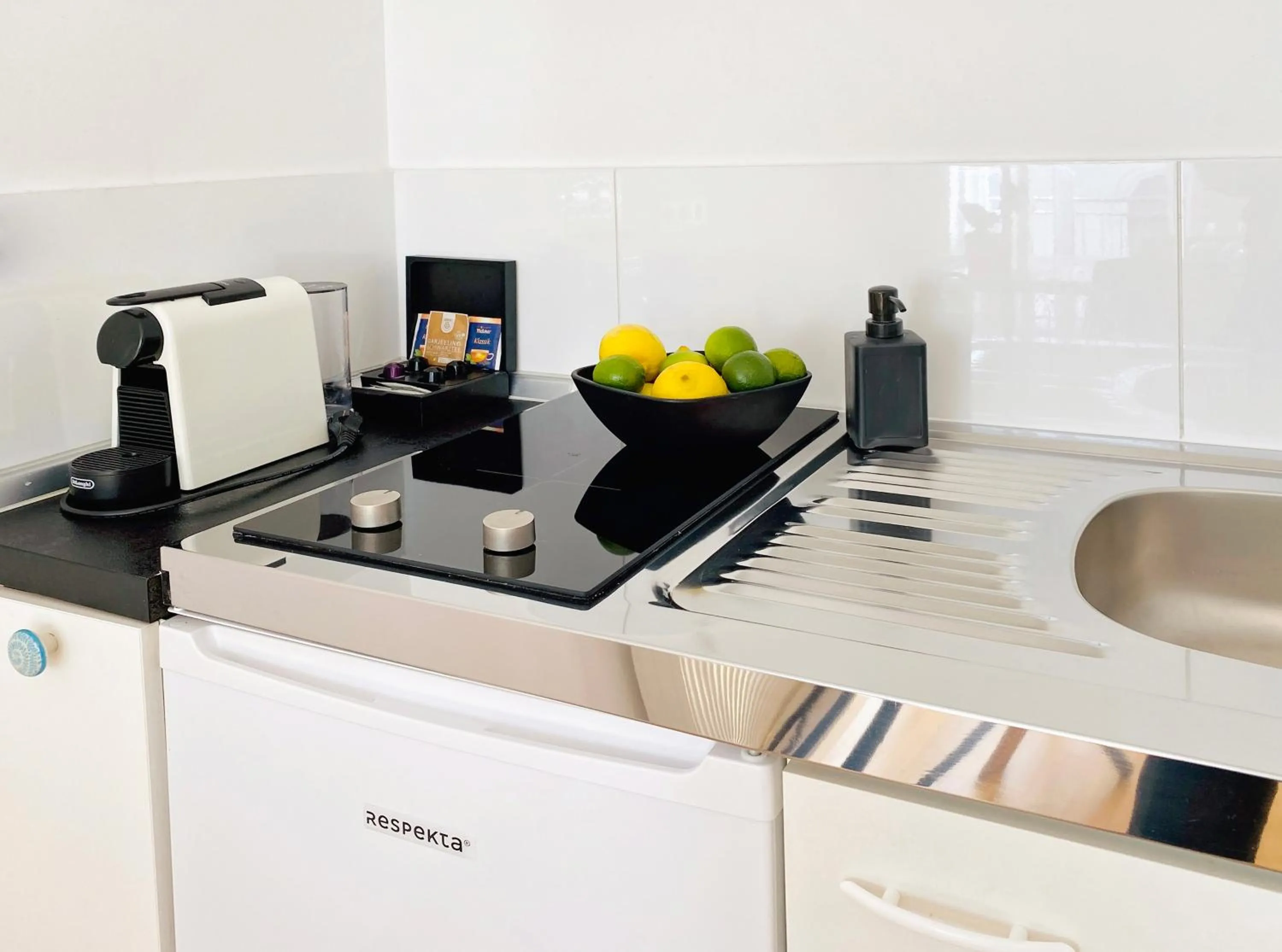 Kitchen or kitchenette in Victoria Apartments