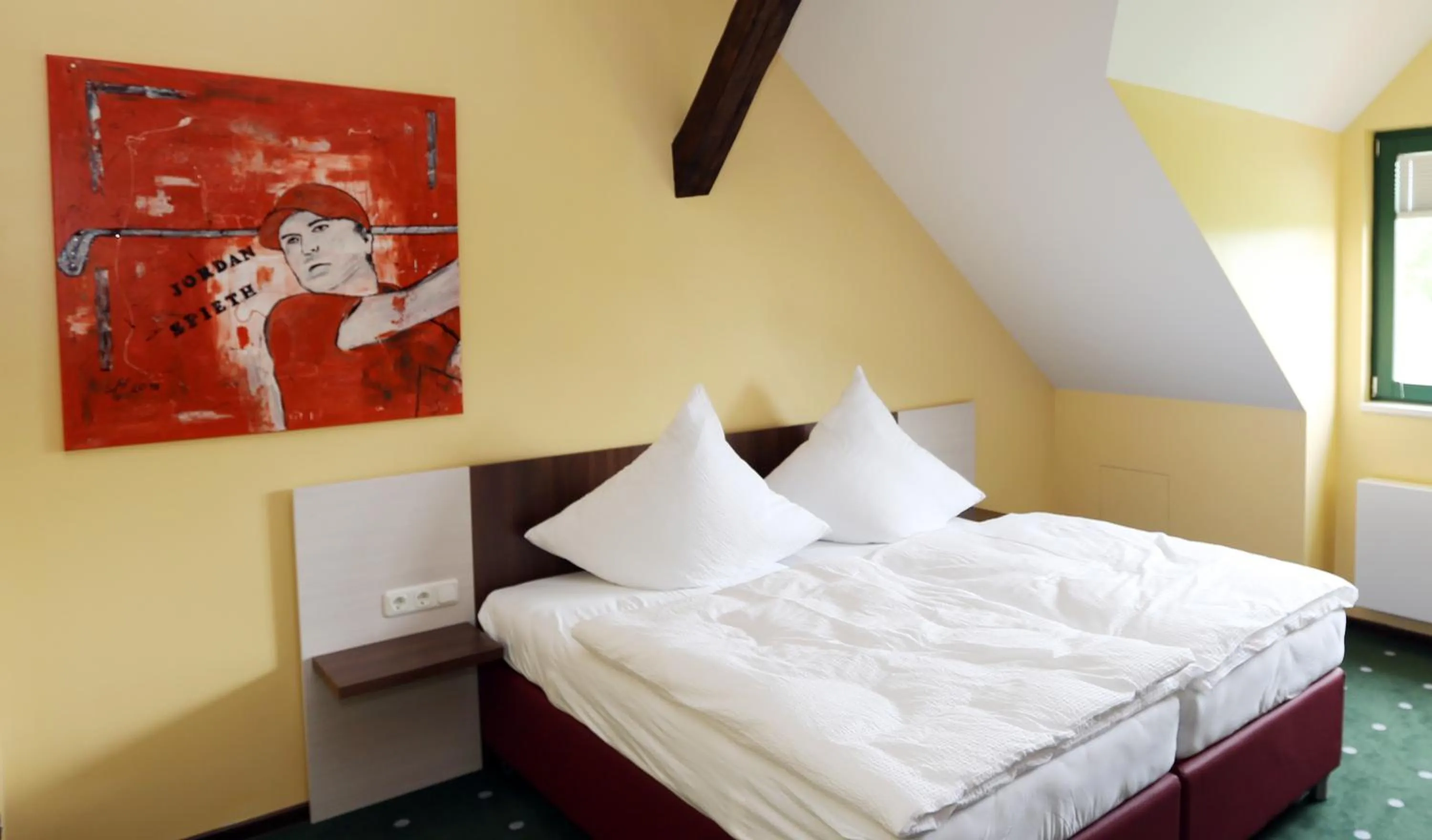 Bed in Apartments Golfpark Schlossgut Sickendorf