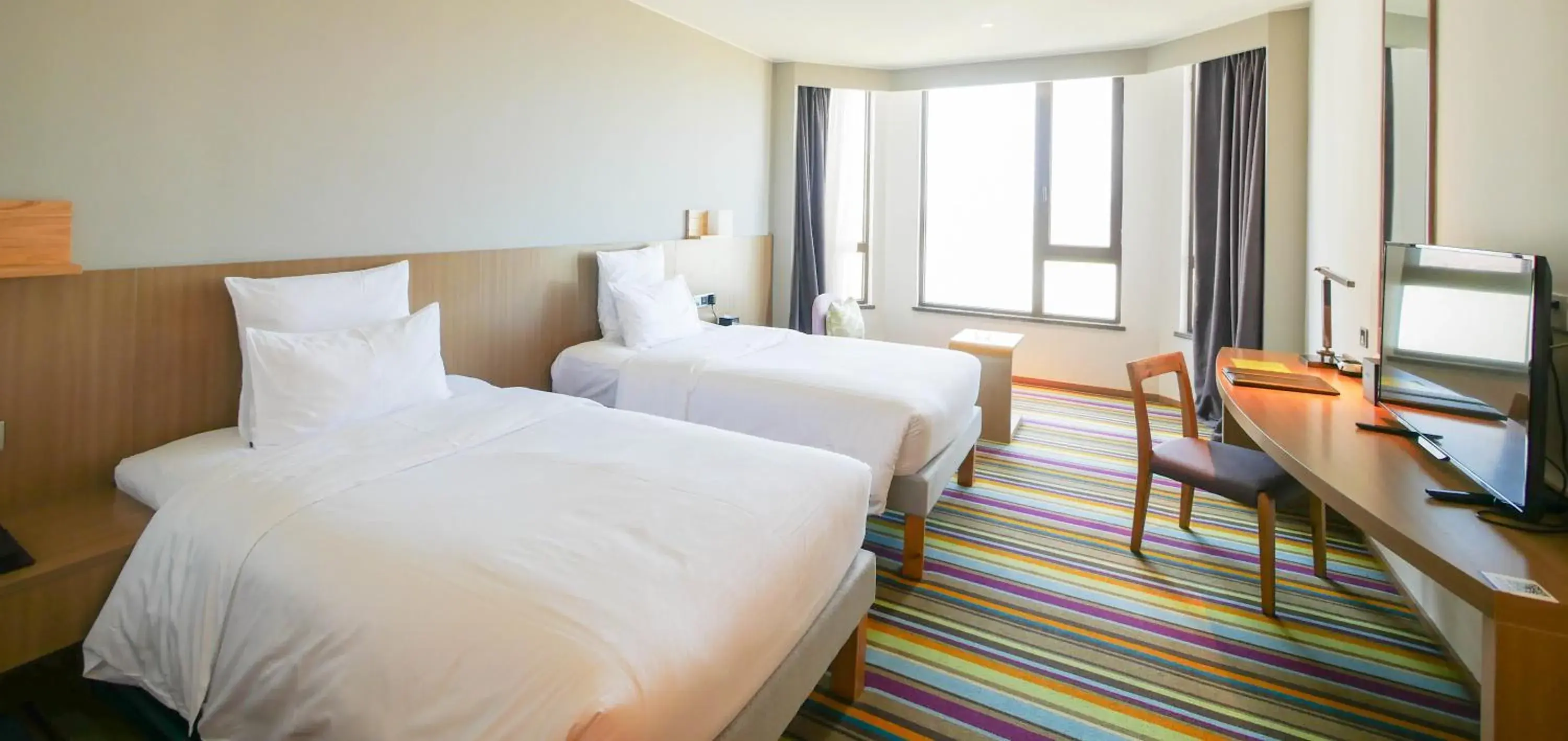 Standard Twin Room with City View in Novotel Nanchang Sunac Standard Twin Room with City View in Novotel Nanchang Sunac