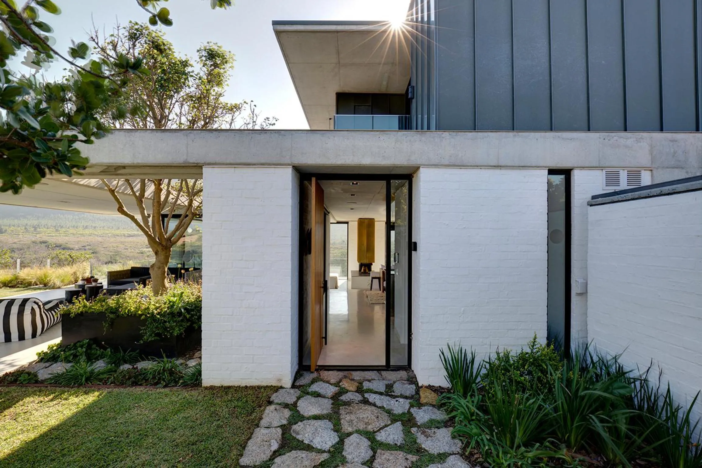 Facade/entrance in Restio River House