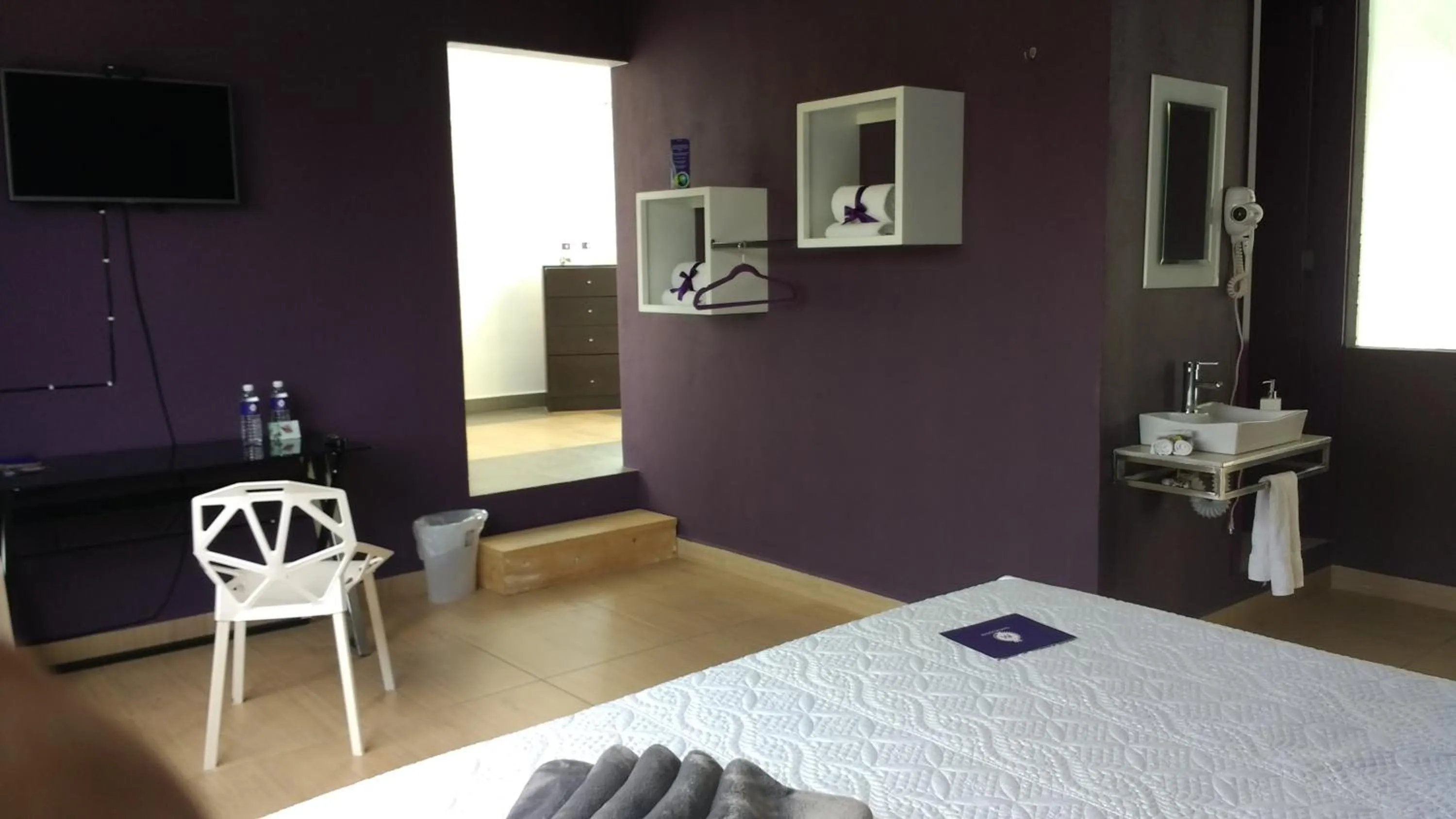 Photo of the whole room, Bed in Rancho Macloy Hotel Spa & Social Events