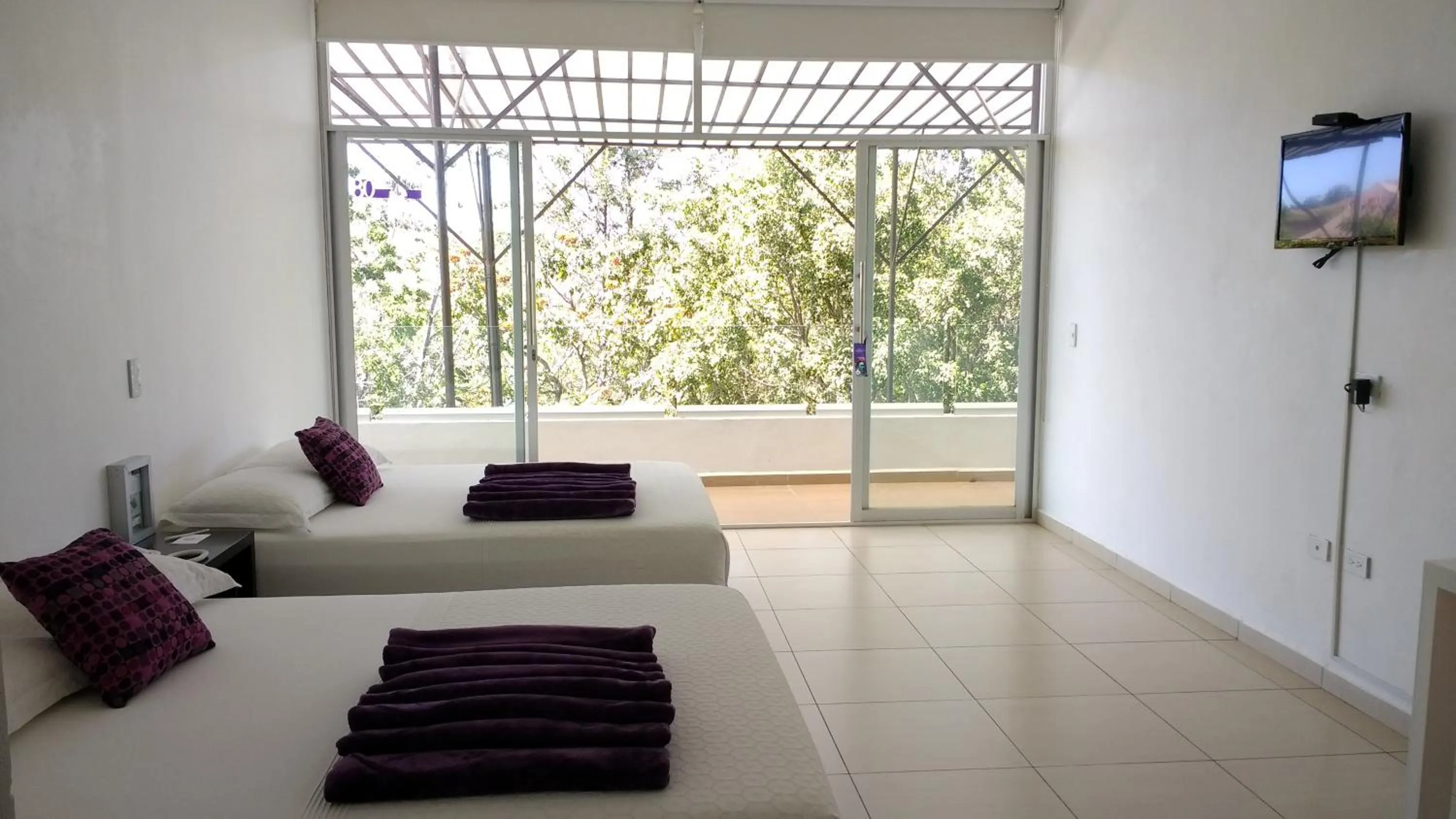 Bedroom, Bed in Rancho Macloy Hotel Spa & Social Events