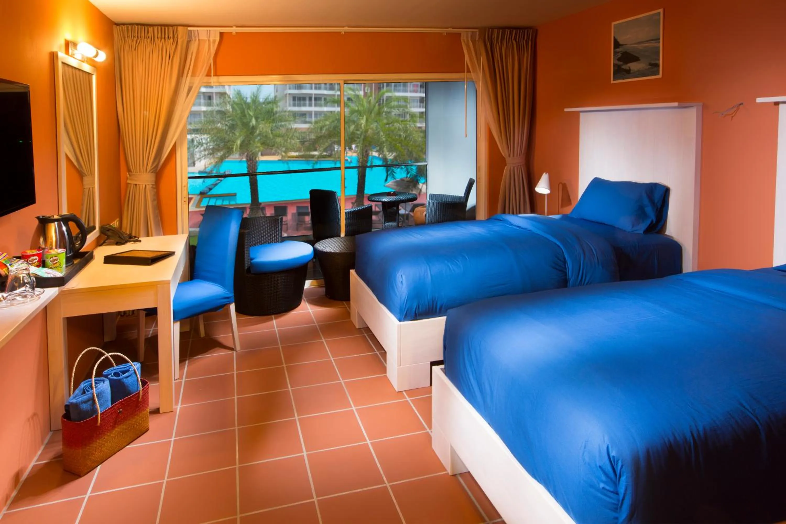 Bed in GrandBlue Resort & Beachclub